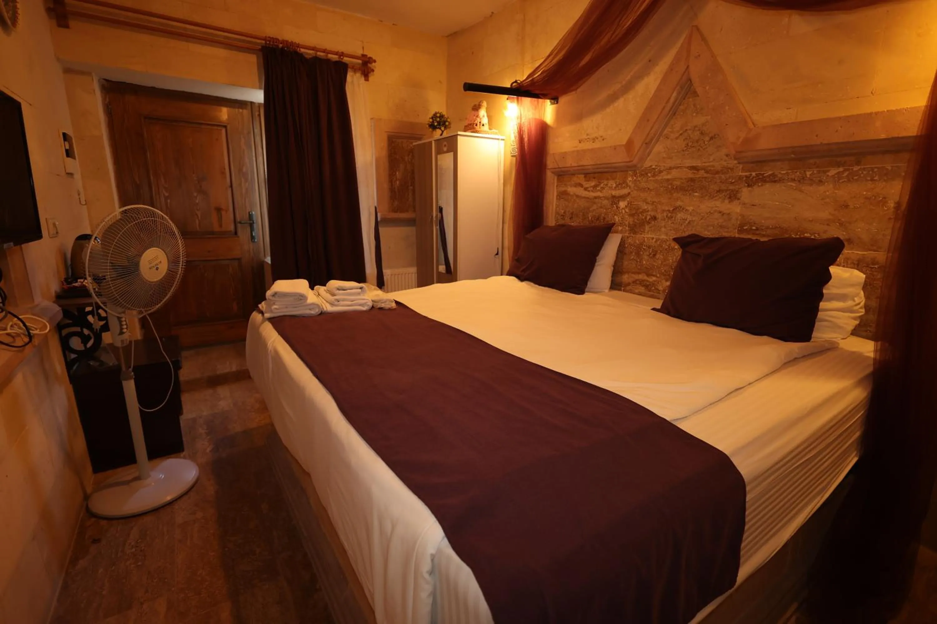 Bed in Lucky Luke Stone House