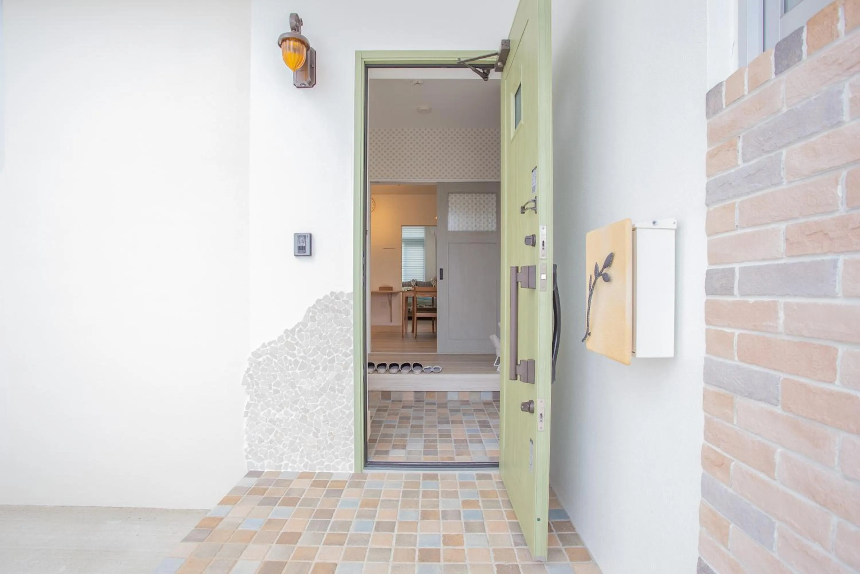 Facade/entrance in stylish House URUMA