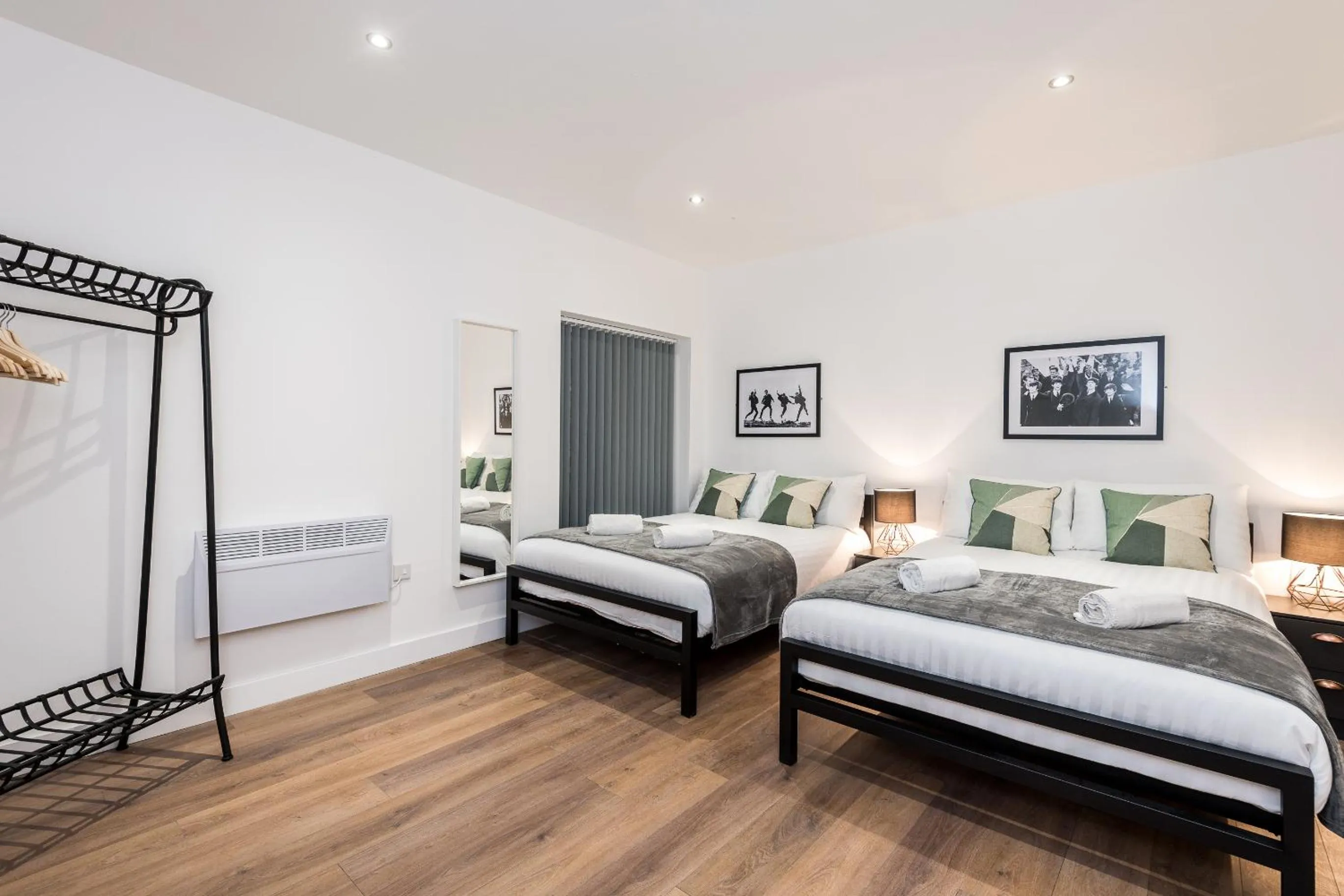 Bed in SGT Peppers Mathew Street Apartments By Happy Days