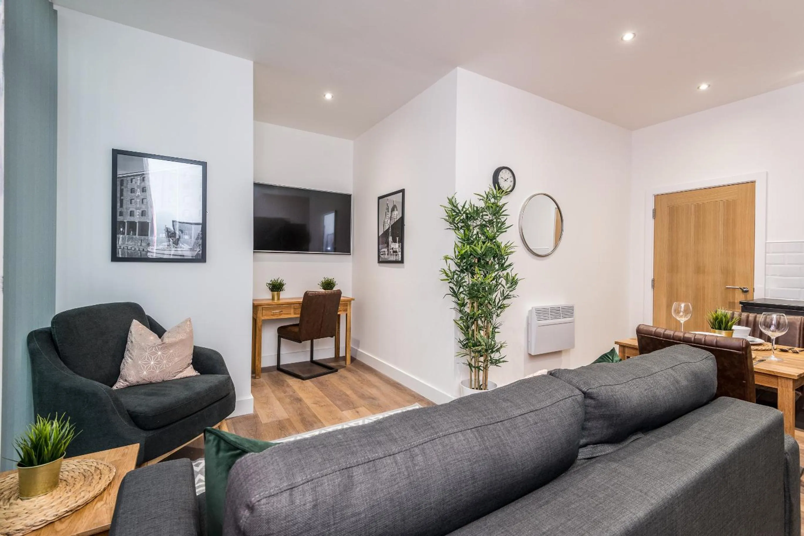 Living room in SGT Peppers Mathew Street Apartments By Happy Days