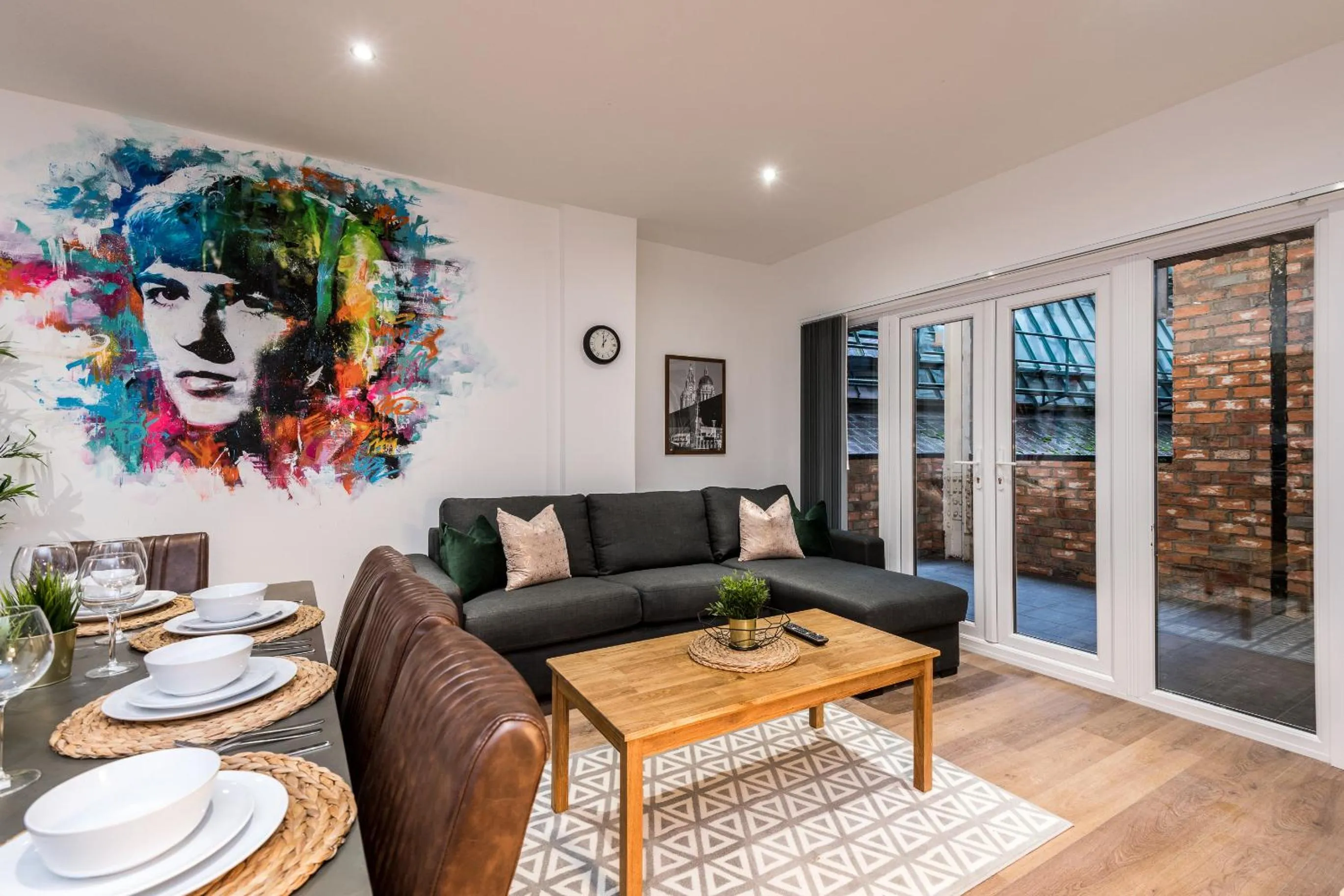 Living room in SGT Peppers Mathew Street Apartments By Happy Days