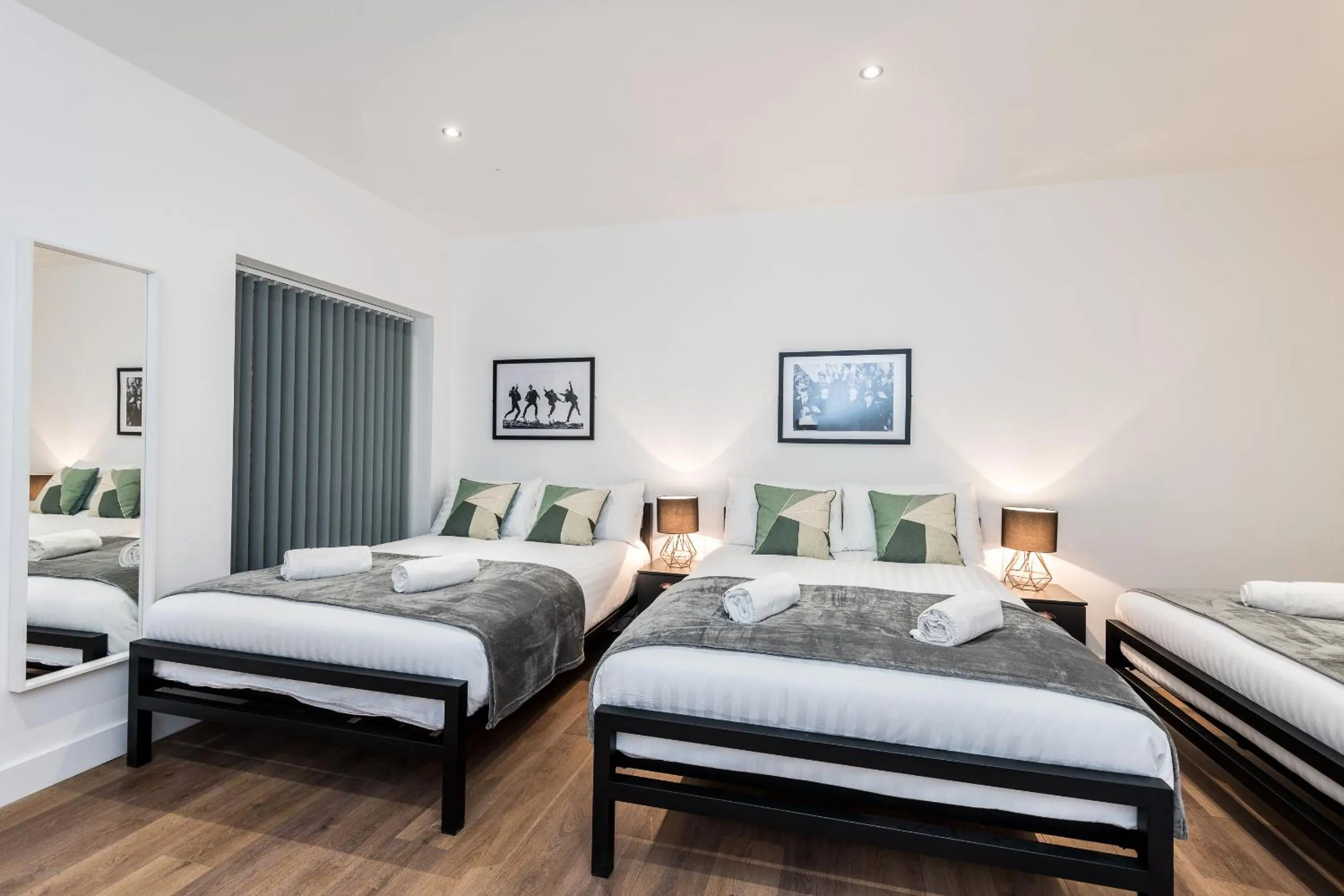 Bed in SGT Peppers Mathew Street Apartments By Happy Days