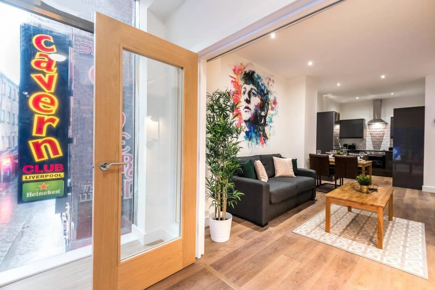 Living room in SGT Peppers Mathew Street Apartments By Happy Days