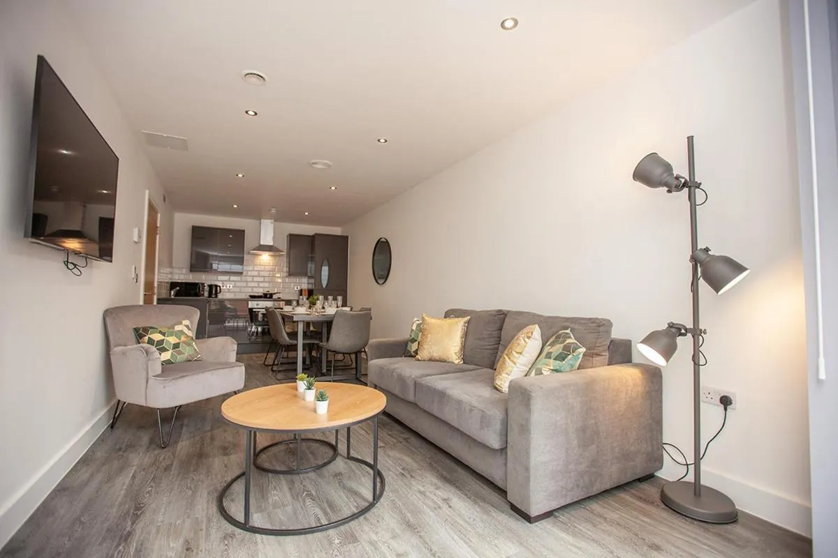 Living room in SGT Peppers Mathew Street Apartments By Happy Days