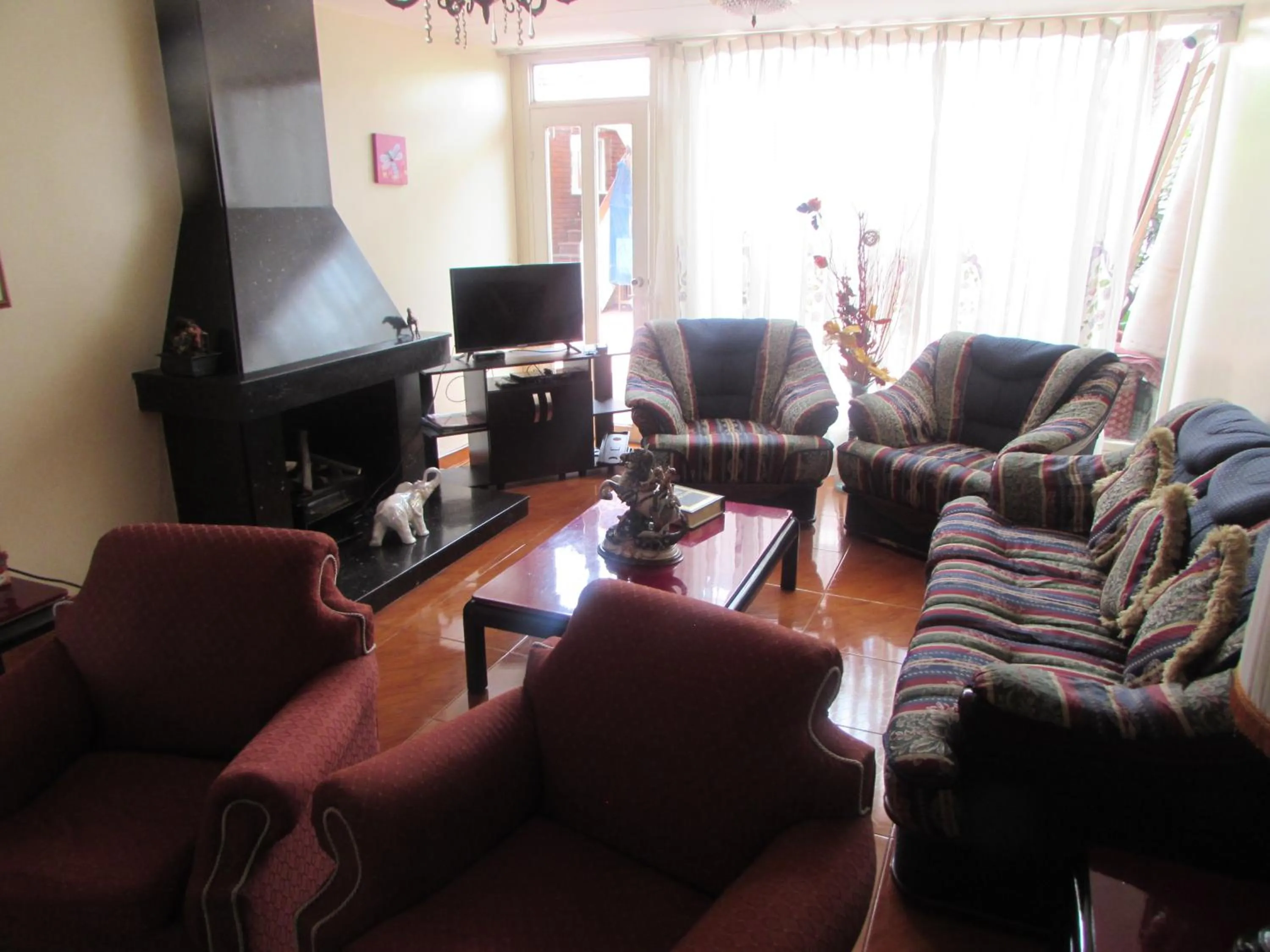 Communal lounge/ TV room in Touristic House
