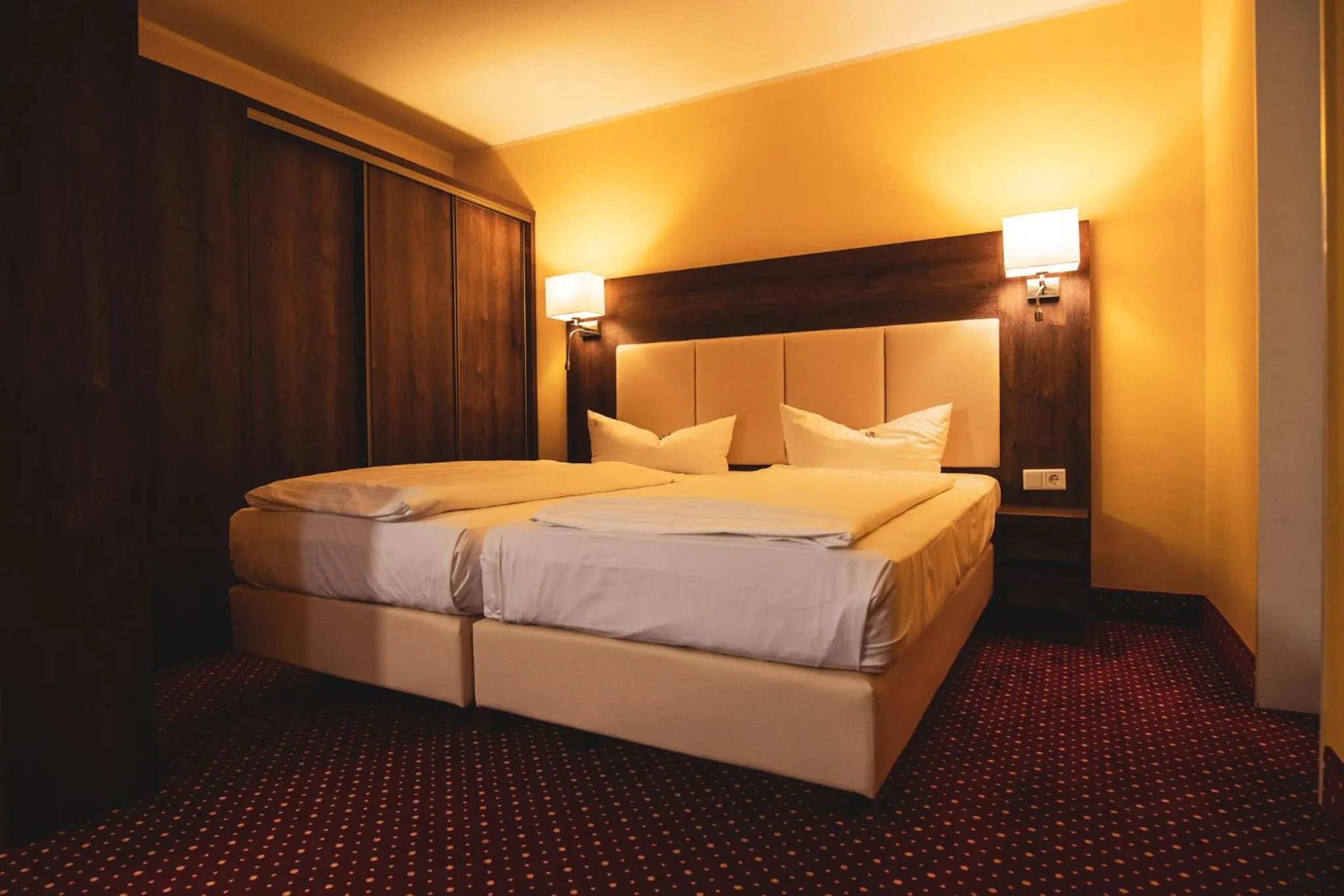 Bed in INVITE Hotel Nürnberg City