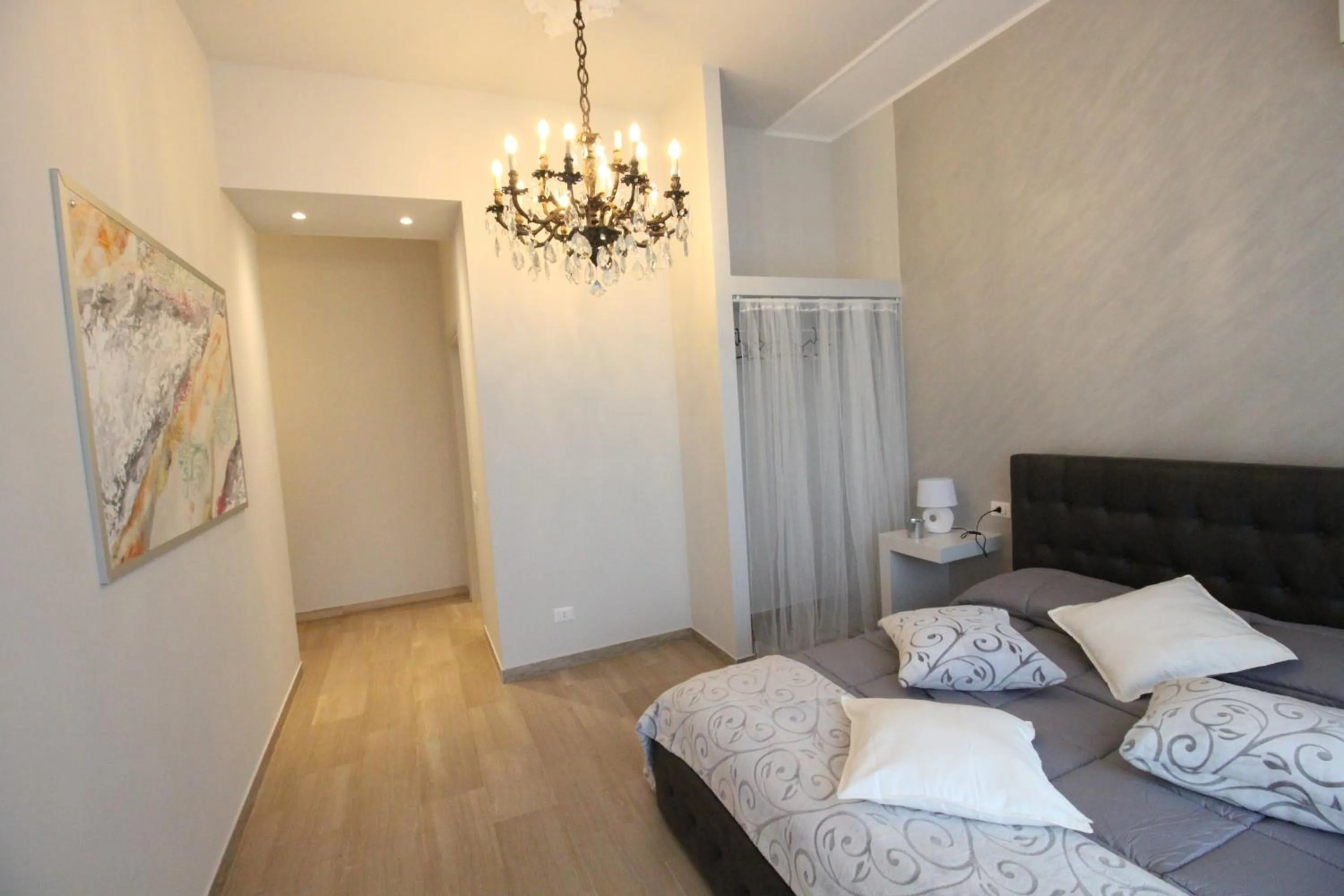 Bed in Ad Astra Rooms