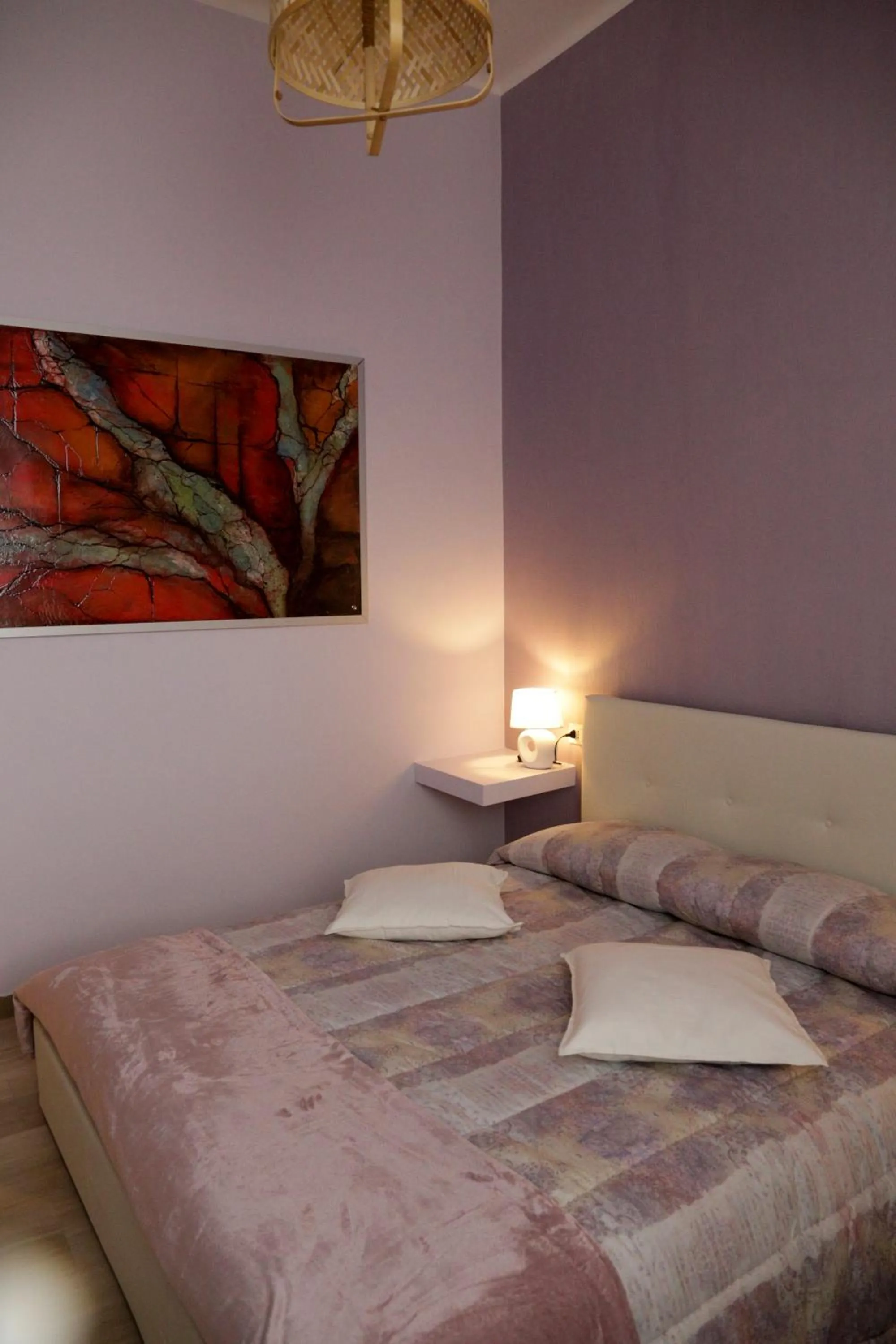 Bed in Ad Astra Rooms