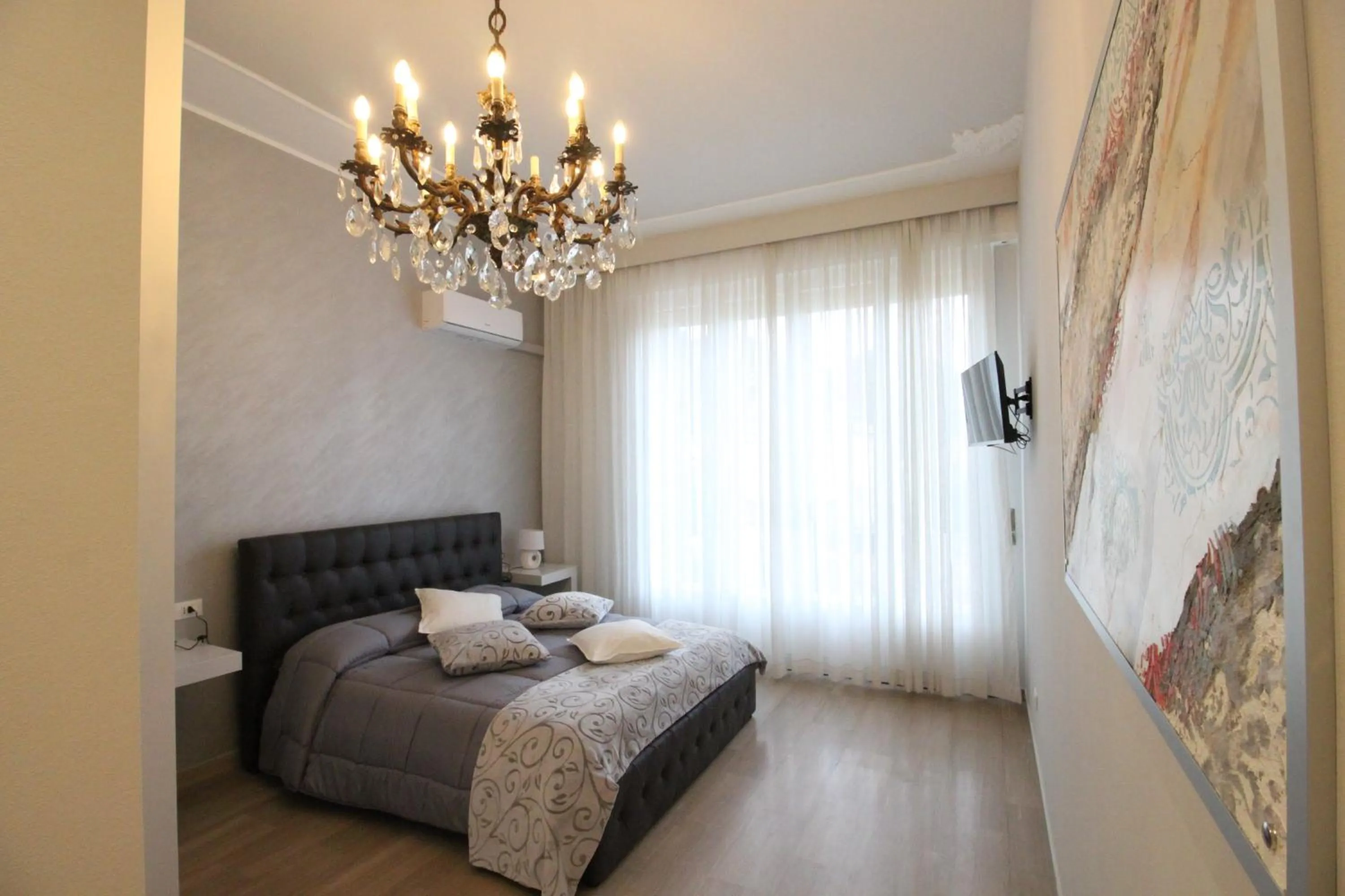 Bed in Ad Astra Rooms