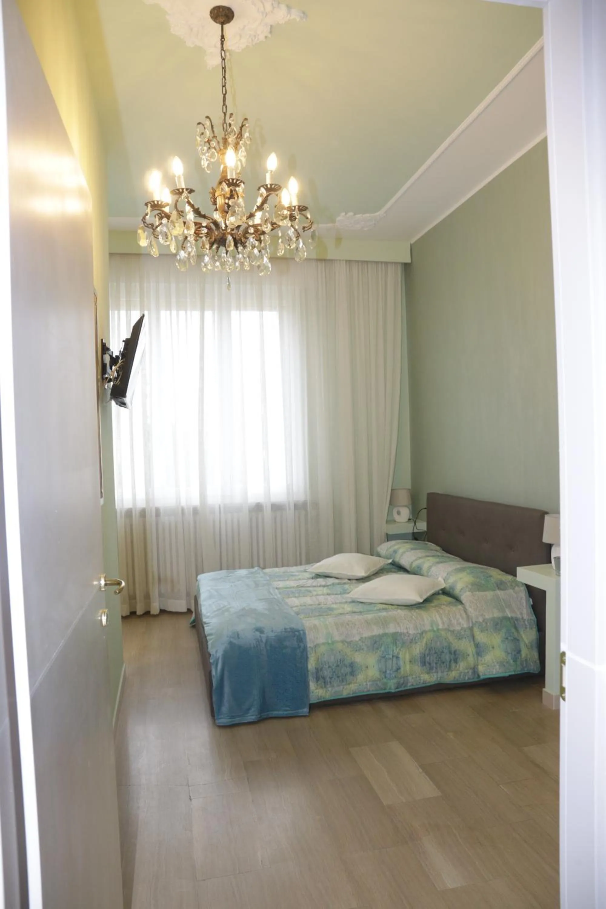 Bed in Ad Astra Rooms