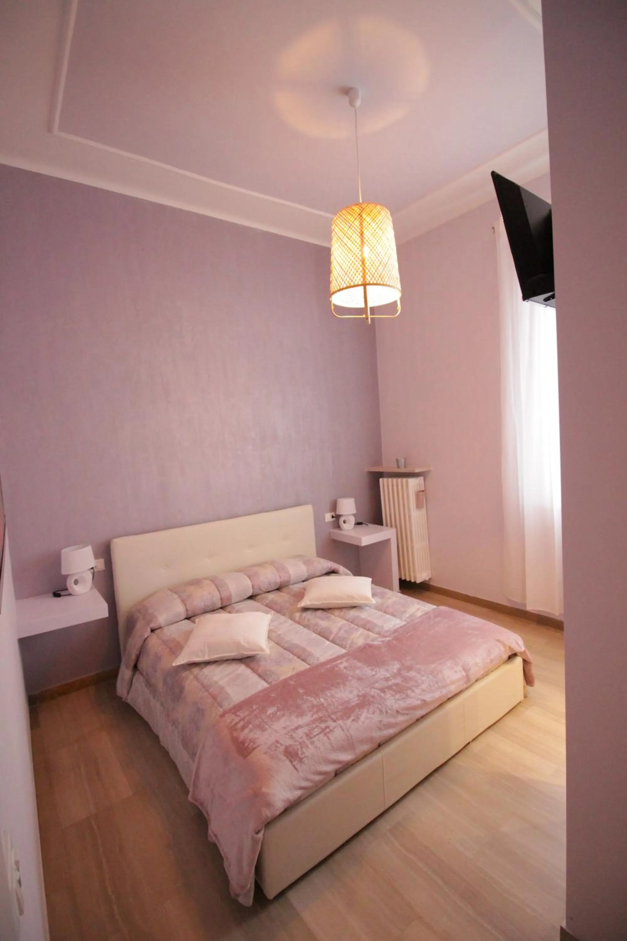 Bed in Ad Astra Rooms