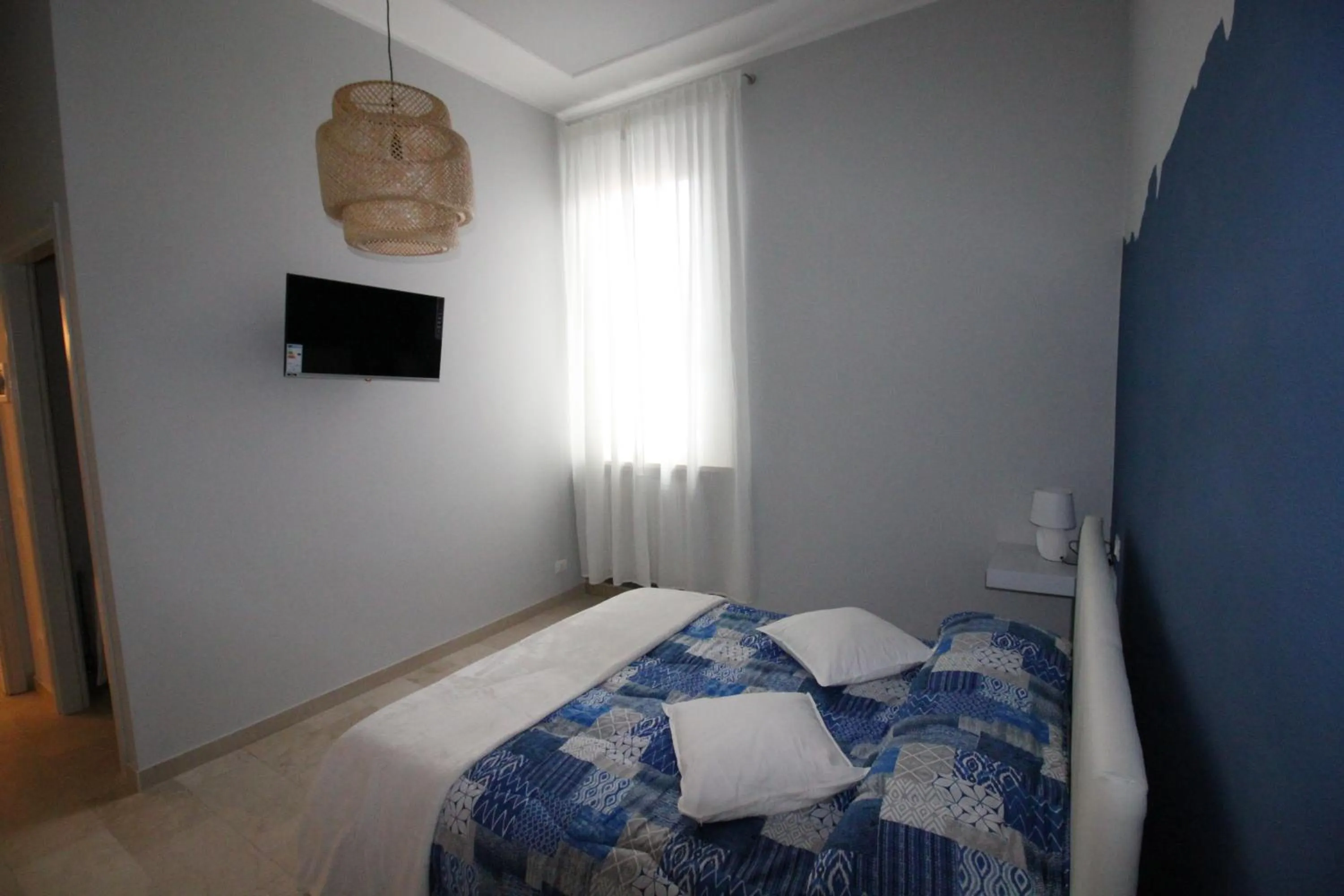 Bed in Ad Astra Rooms