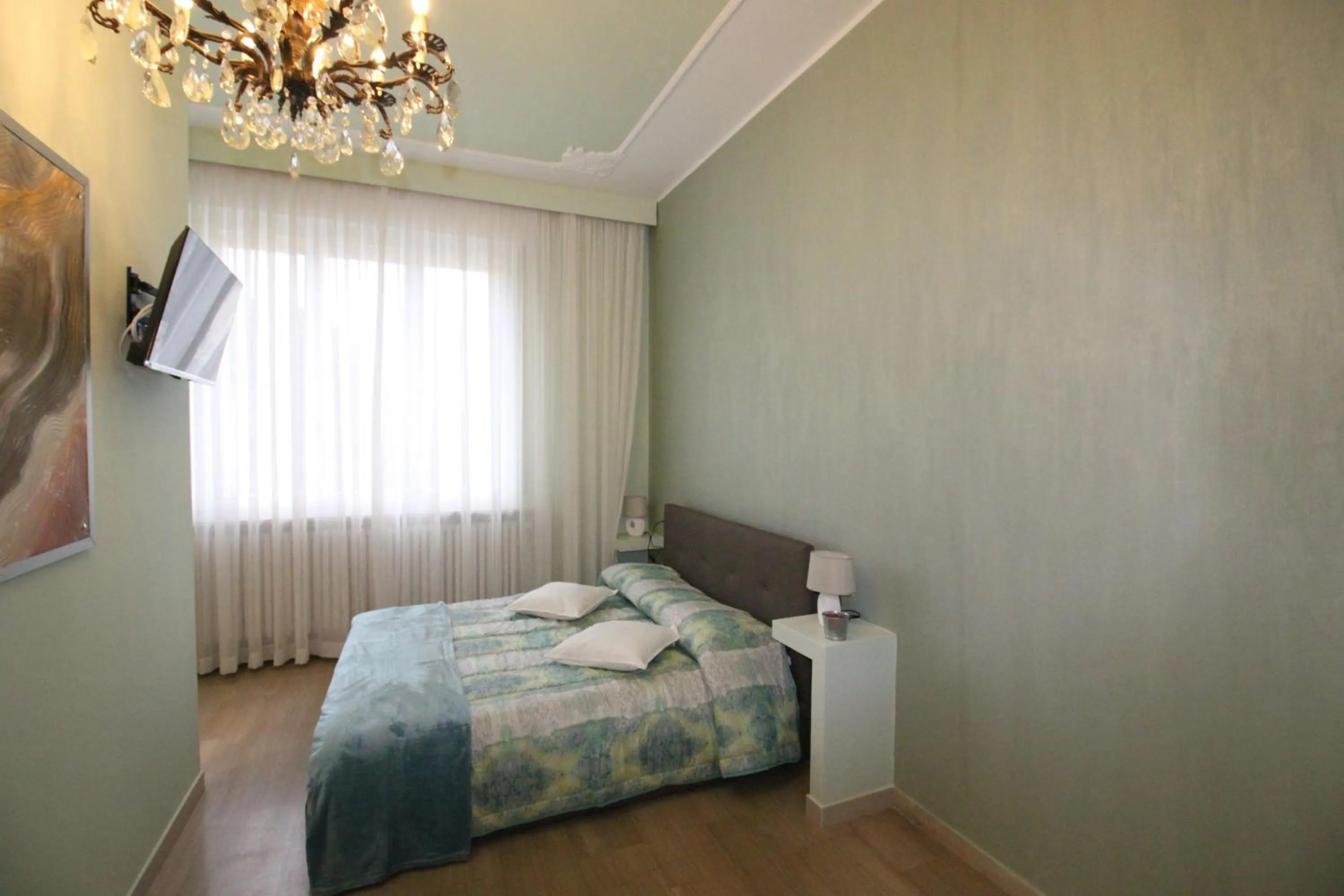 Bed in Ad Astra Rooms