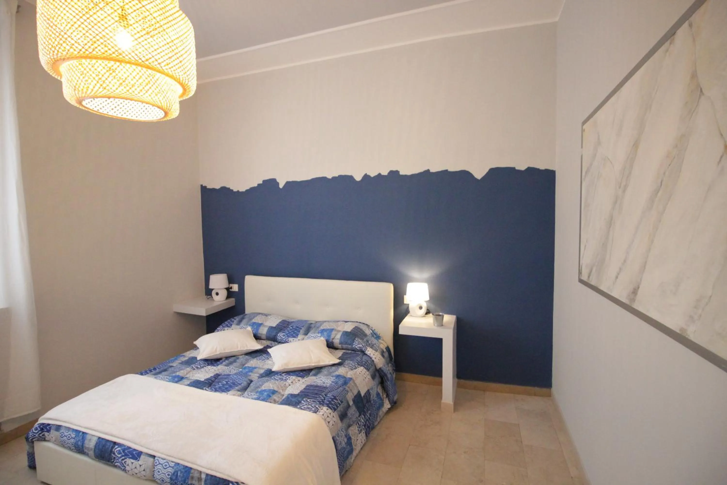 Bed in Ad Astra Rooms