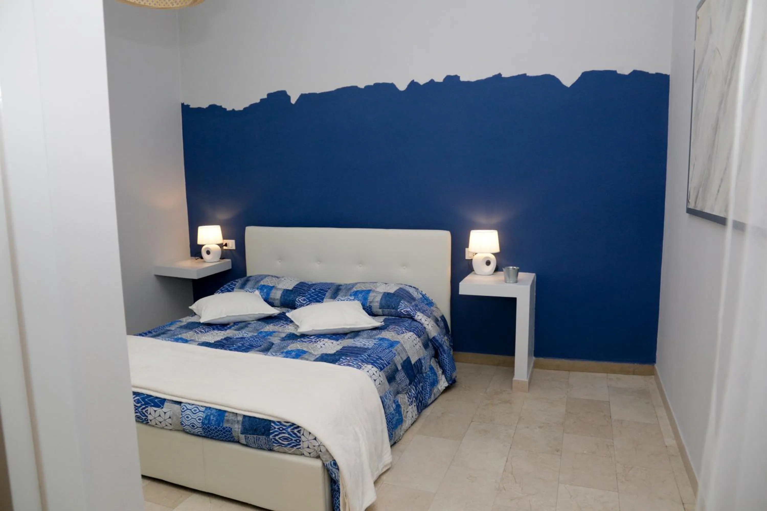 Bed in Ad Astra Rooms