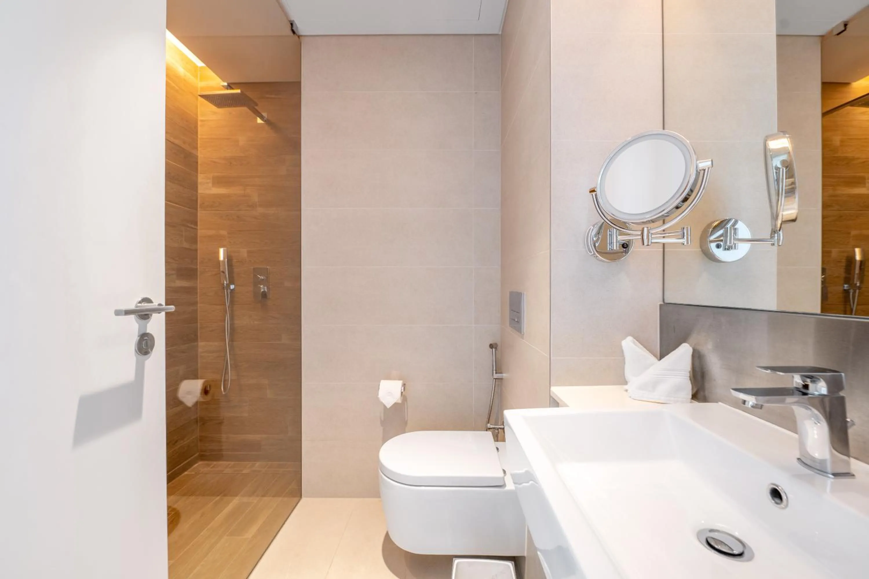 Shower in Lavish & Equipped oceanfront 2 BR facing Ain Dubai