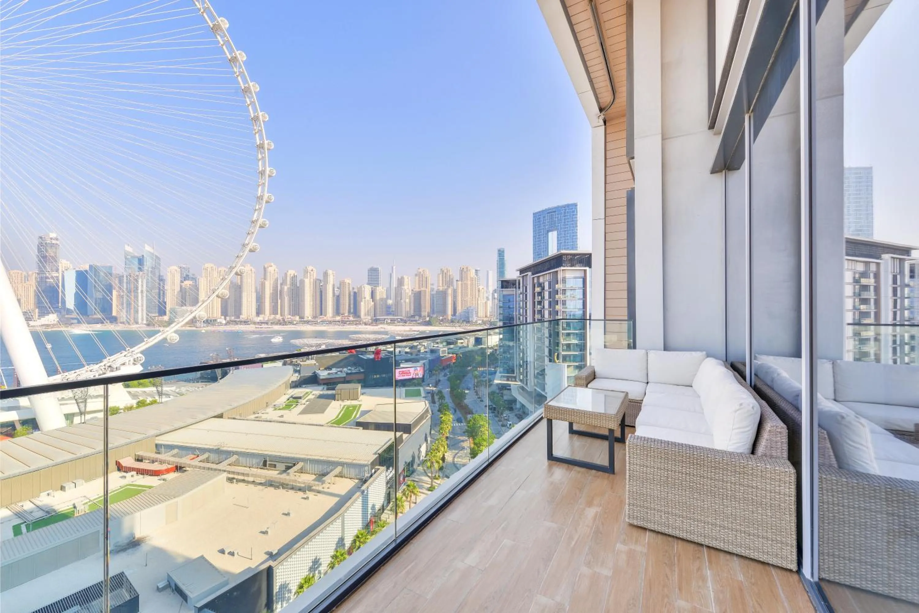 Patio in Lavish & Equipped oceanfront 2 BR facing Ain Dubai