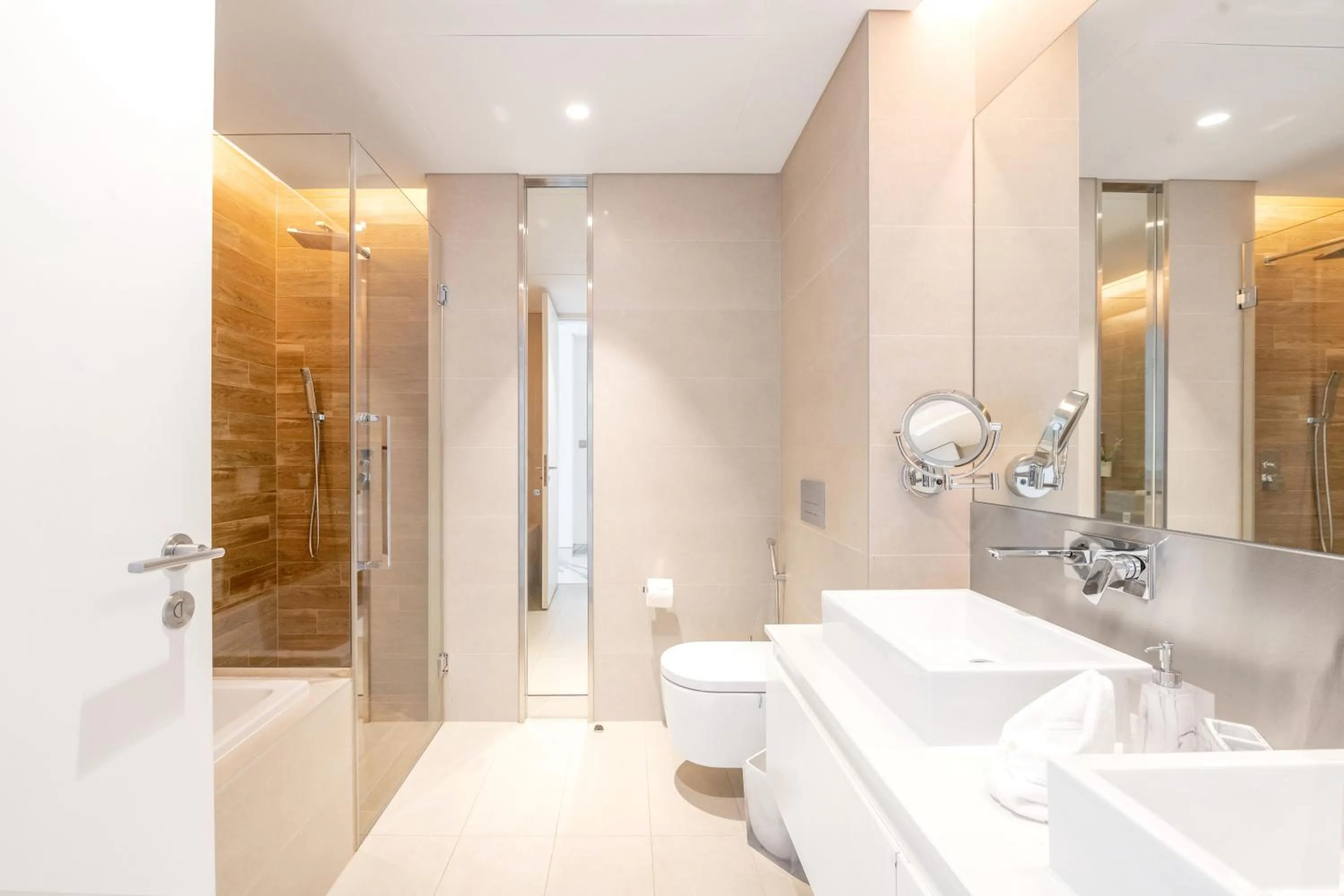 Shower in Lavish & Equipped oceanfront 2 BR facing Ain Dubai