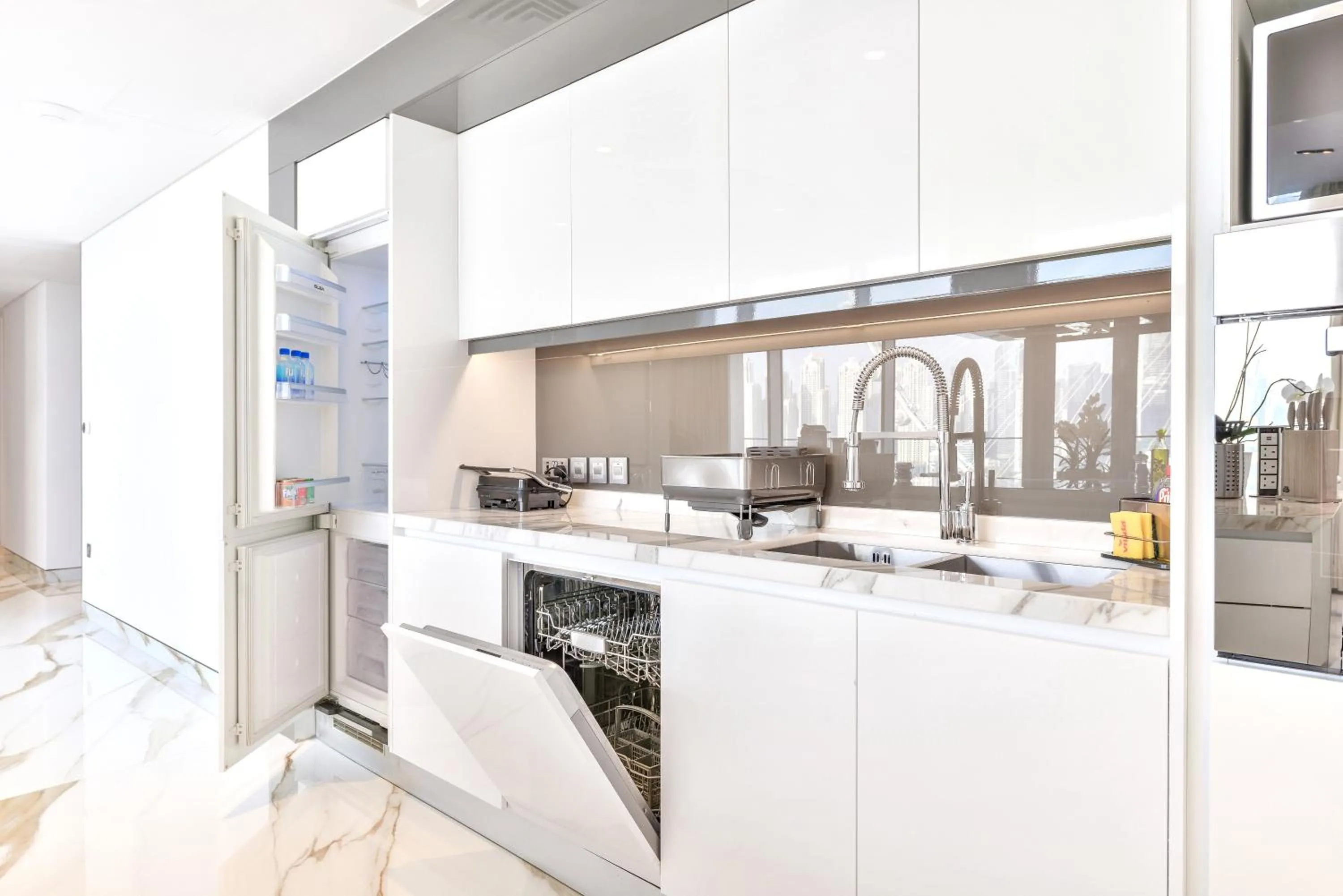 Kitchen or kitchenette in Lavish & Equipped oceanfront 2 BR facing Ain Dubai