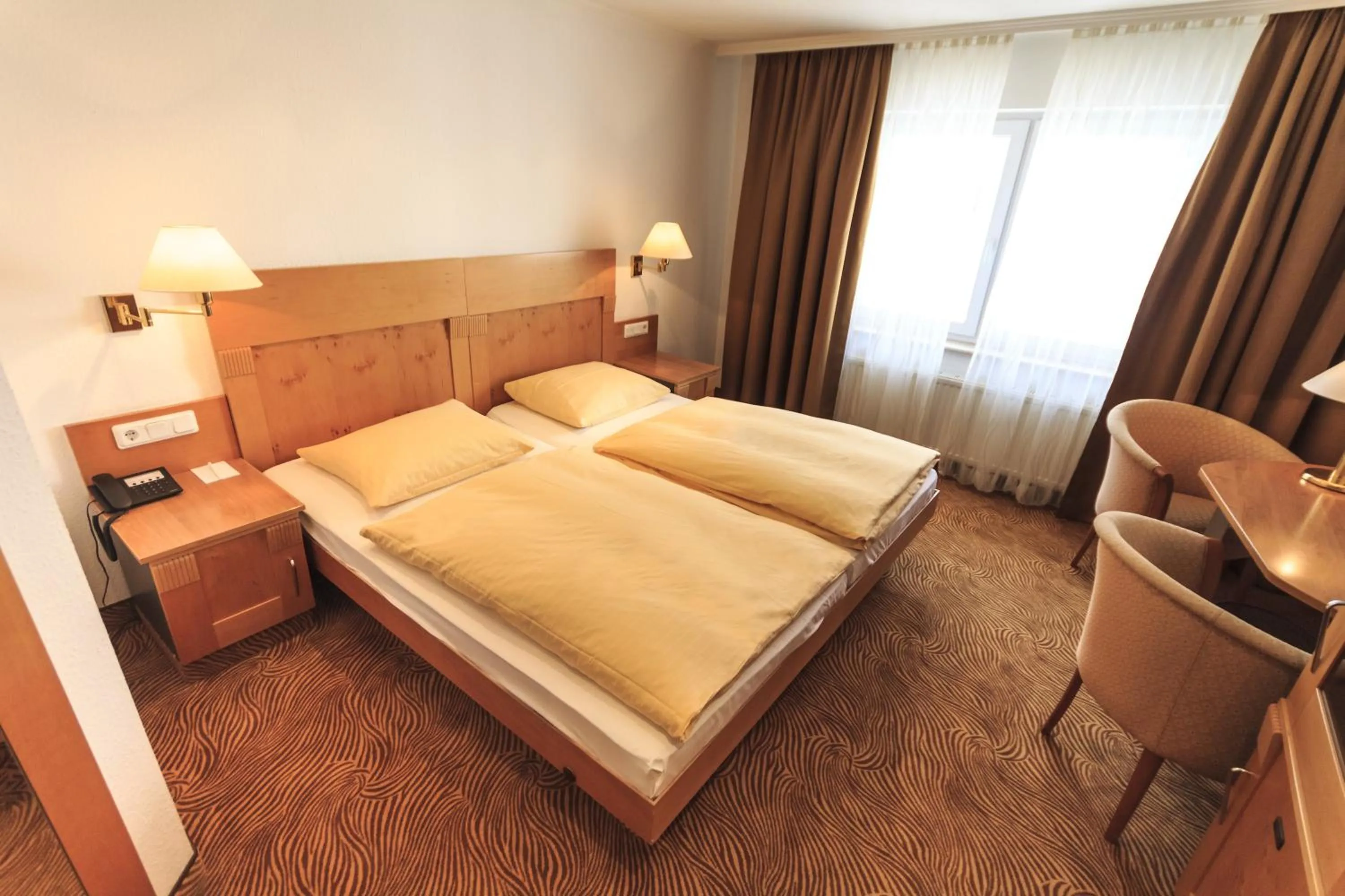 Photo of the whole room, Bed in Rebgarten Hotel Adler