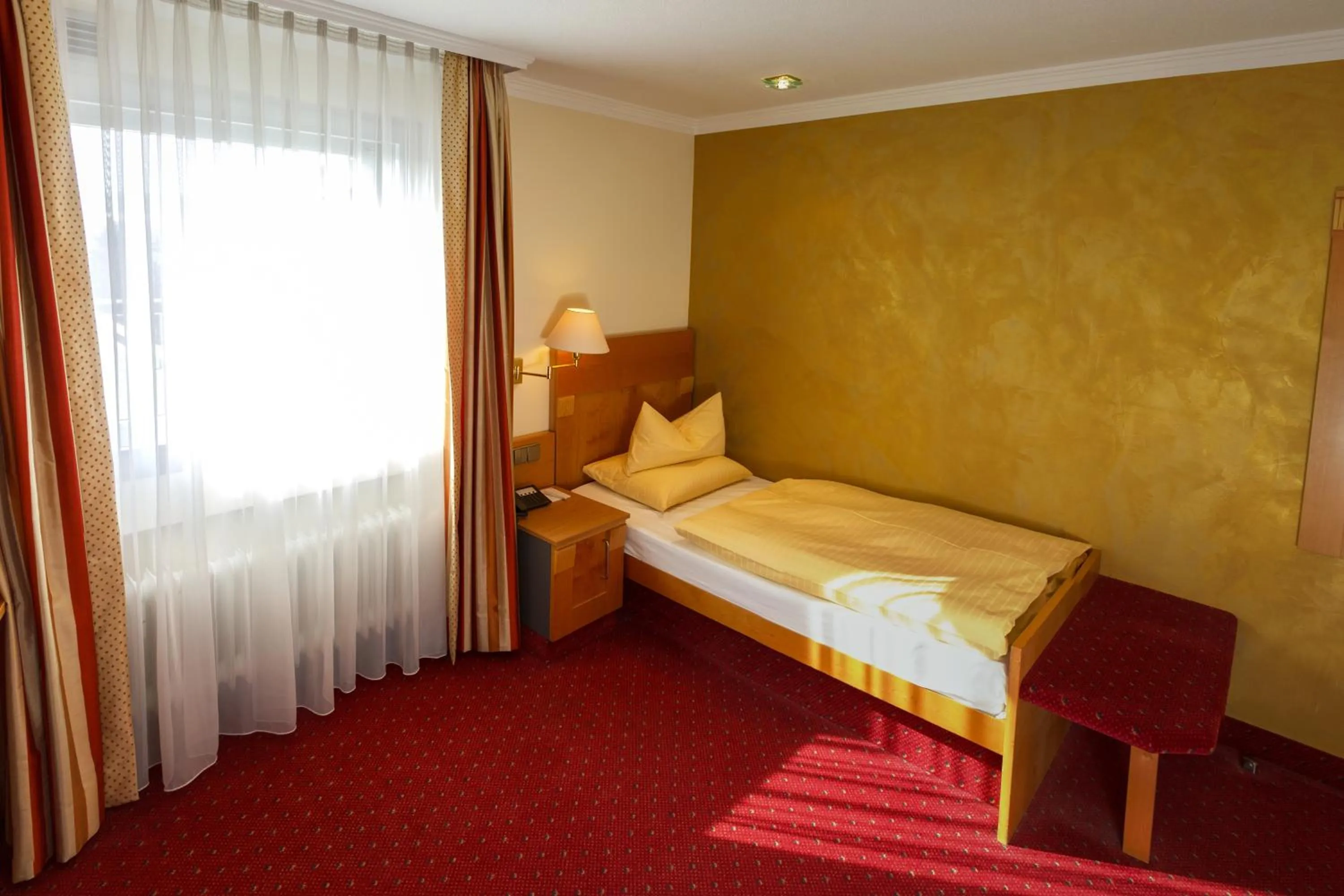 Photo of the whole room, Bed in Rebgarten Hotel Adler