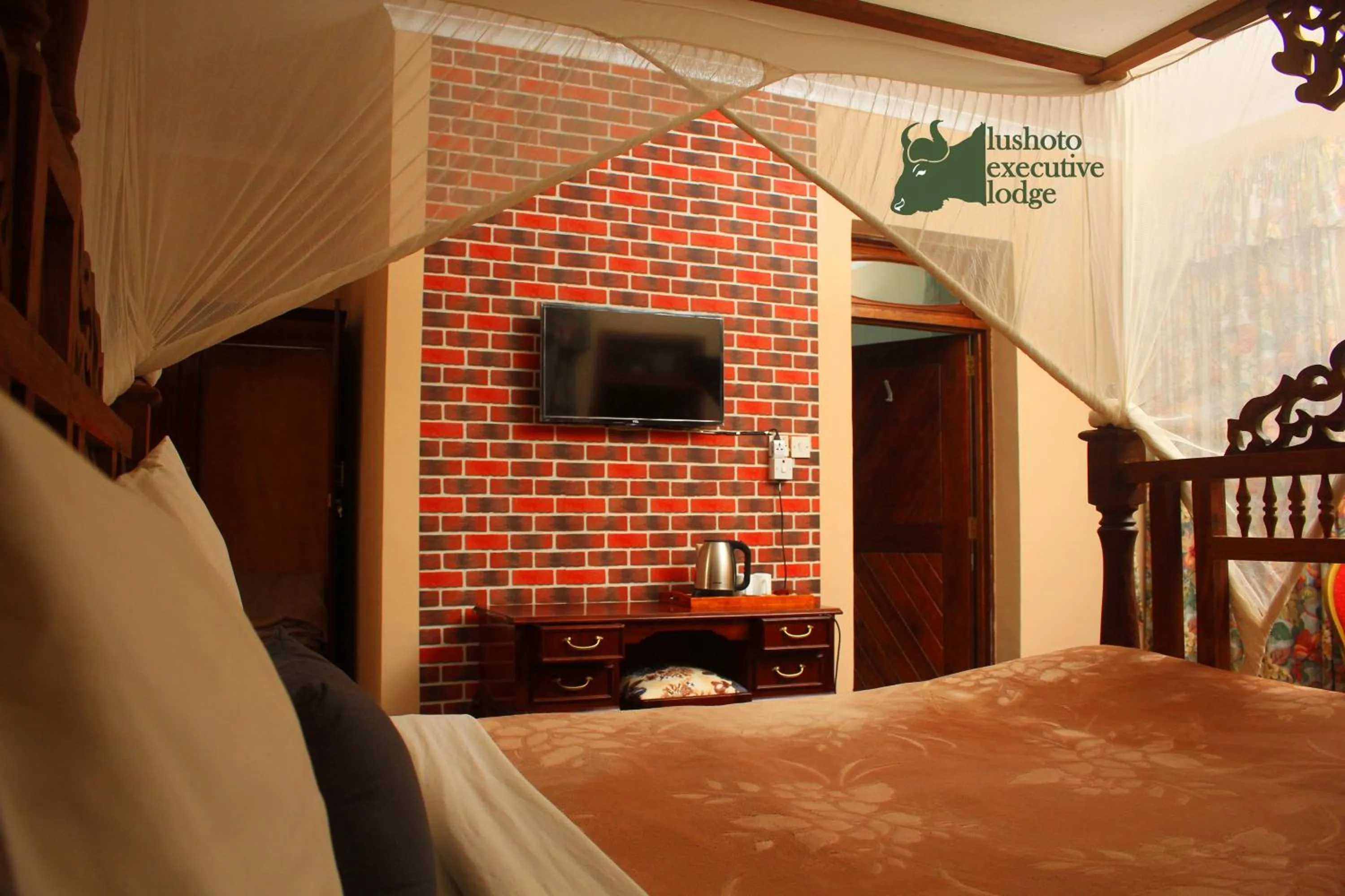 Property building, Bed in LUSHOTO EXECUTIVE LODGE