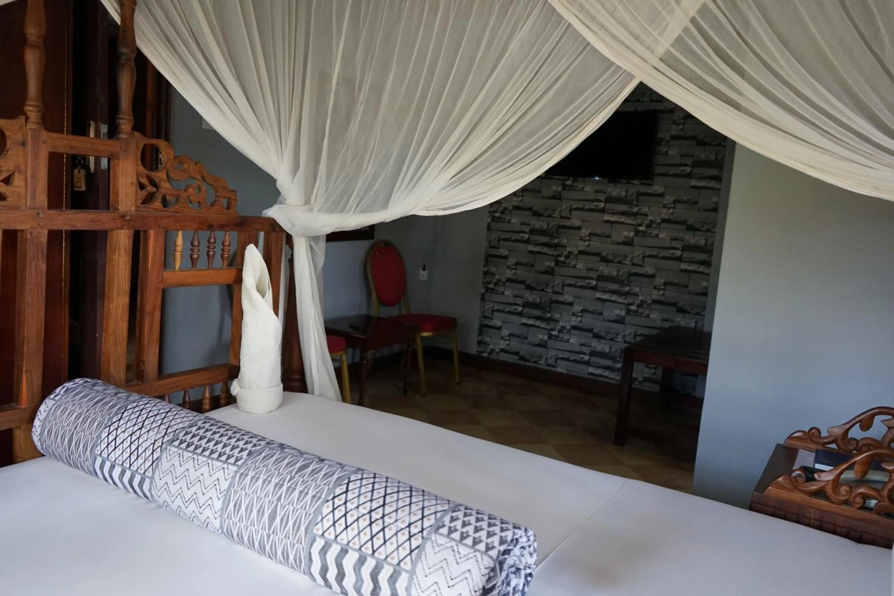 Photo of the whole room, Bed in LUSHOTO EXECUTIVE LODGE