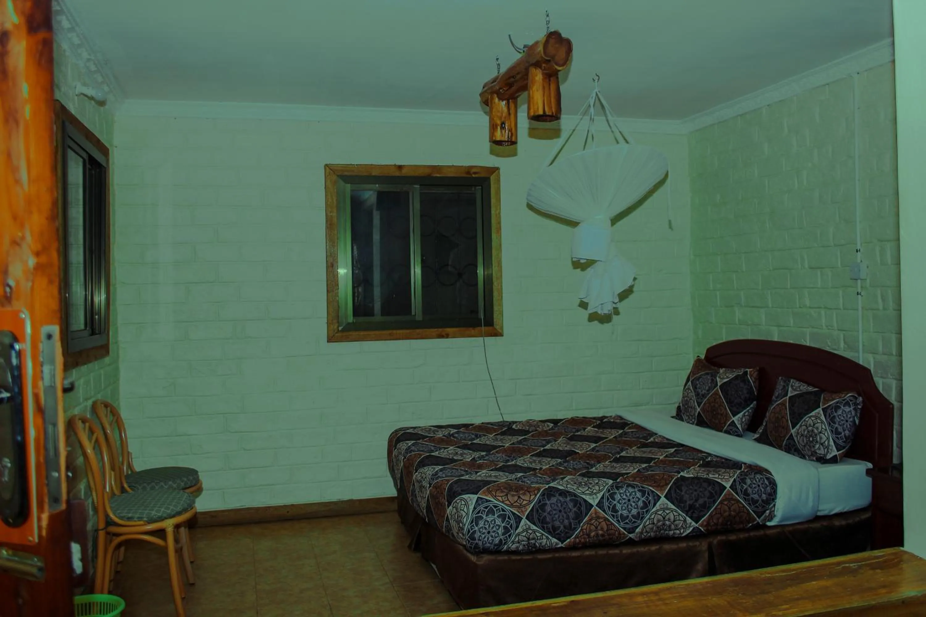 Bed in LUSHOTO EXECUTIVE LODGE