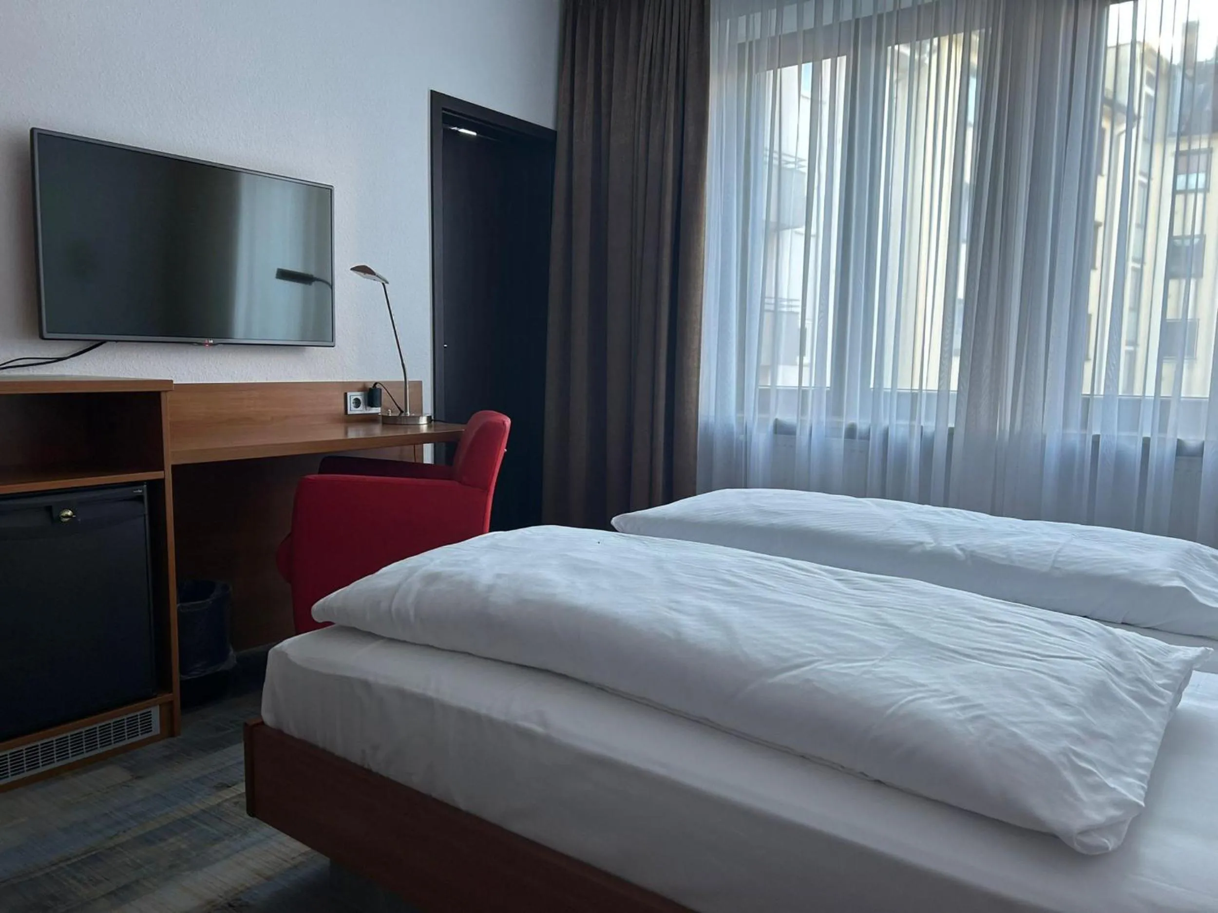Property building, Bed in Hotel Fackelmann
