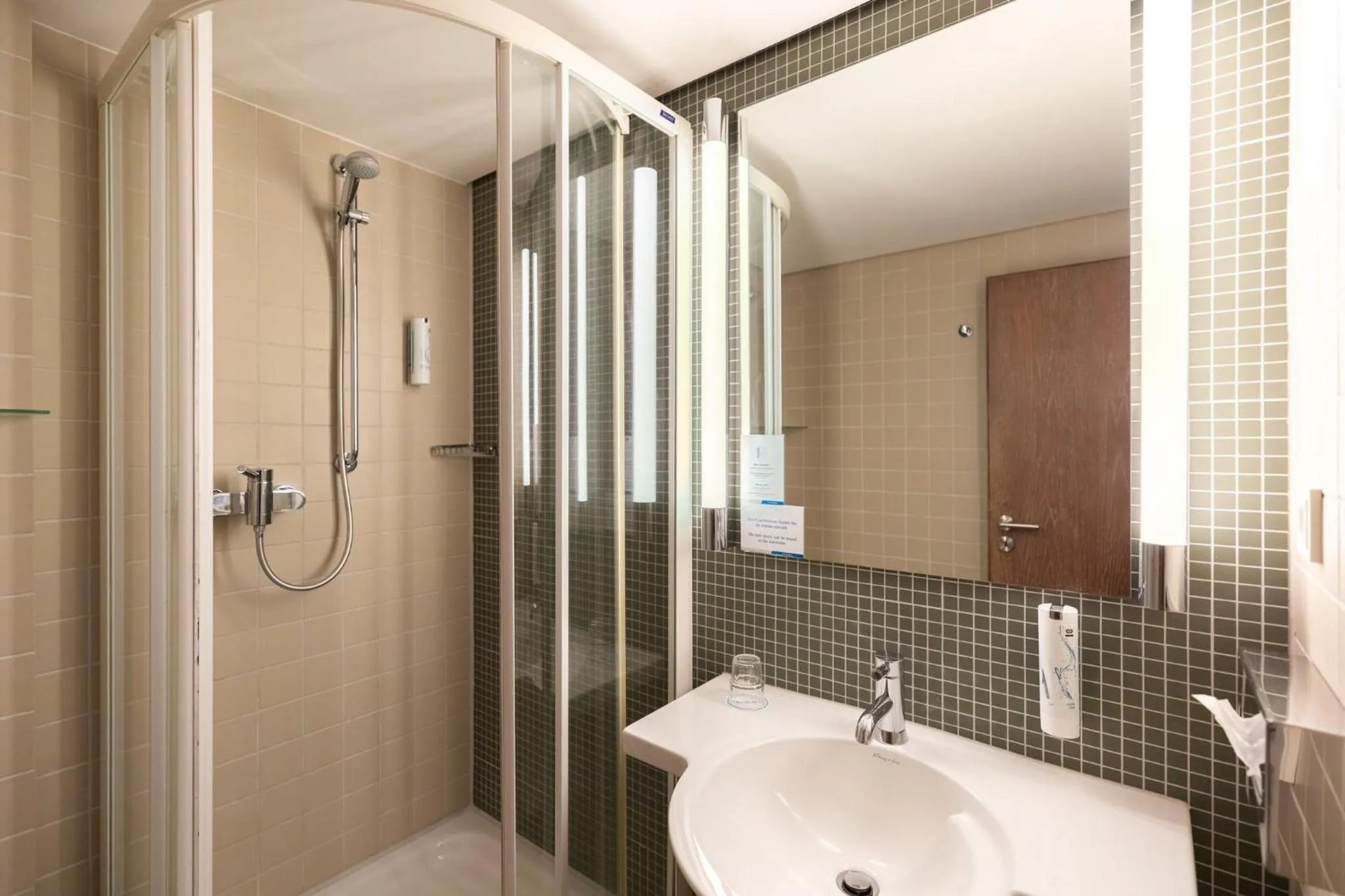Bathroom in Garner Hotel Cologne East by IHG