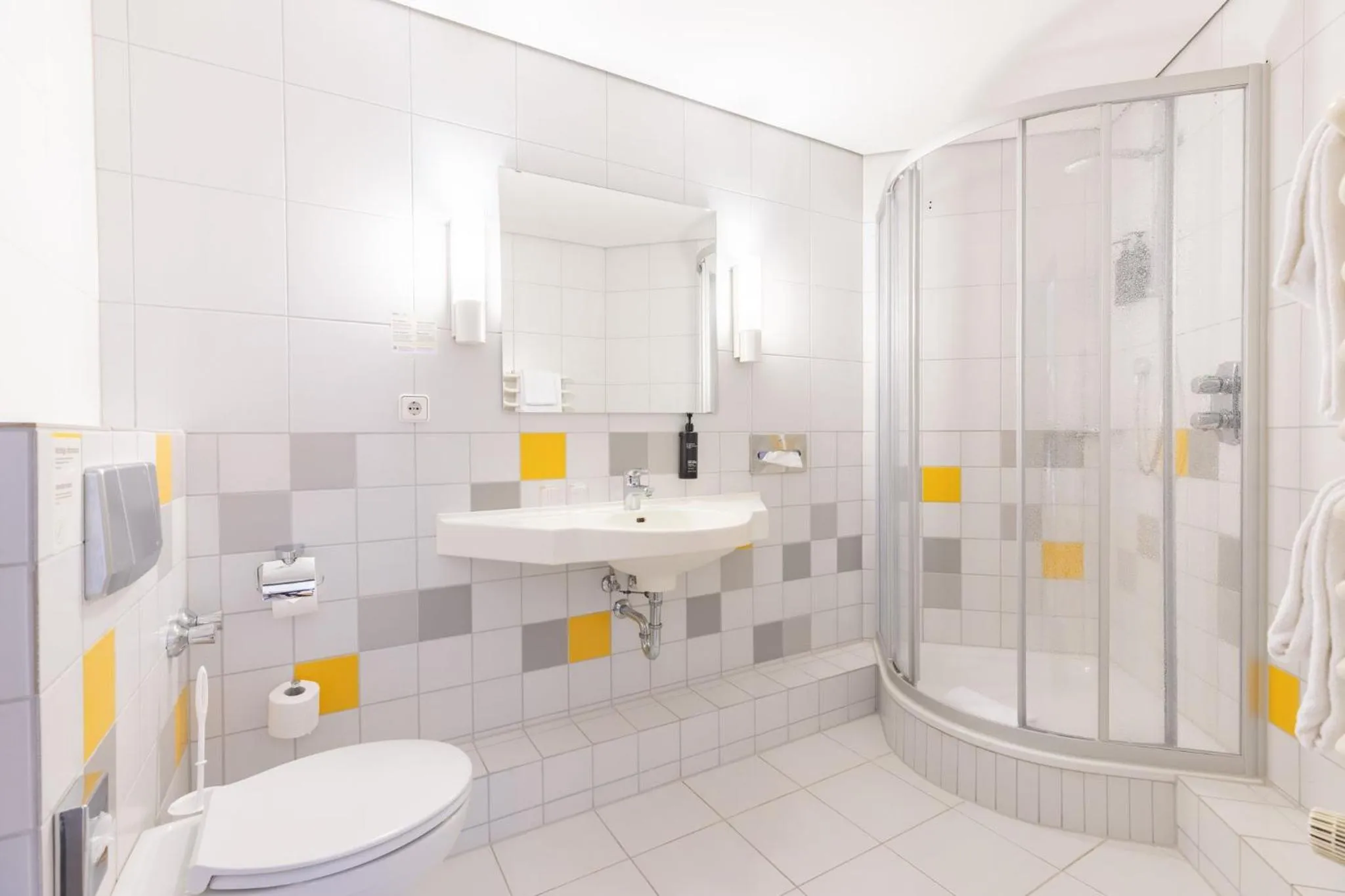 Bathroom in Garner Hotel Cologne East by IHG