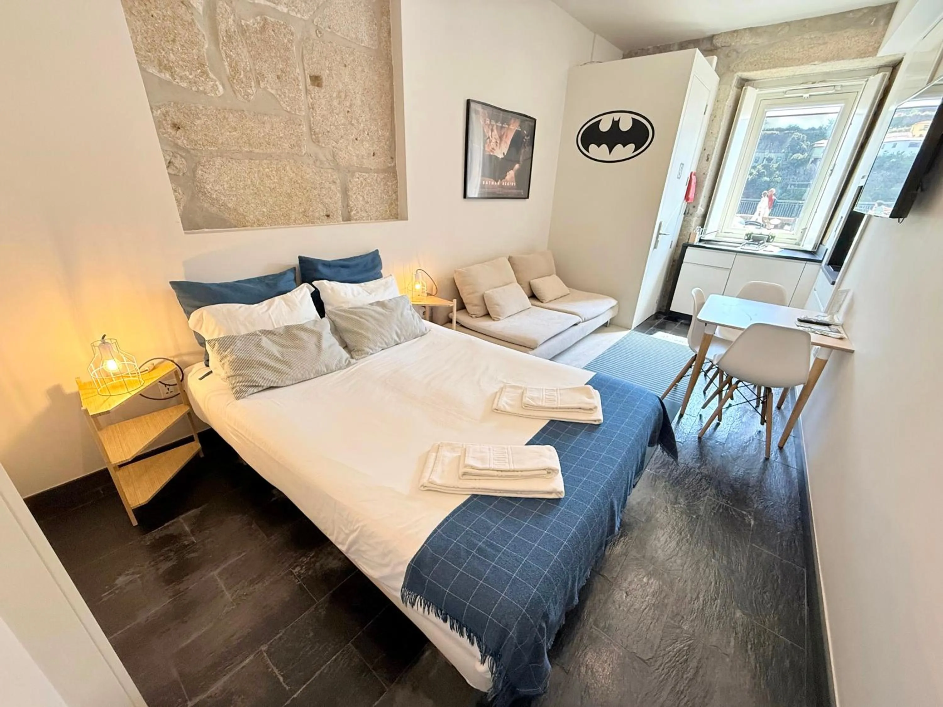 Bed in Ribeira Cinema Apartments