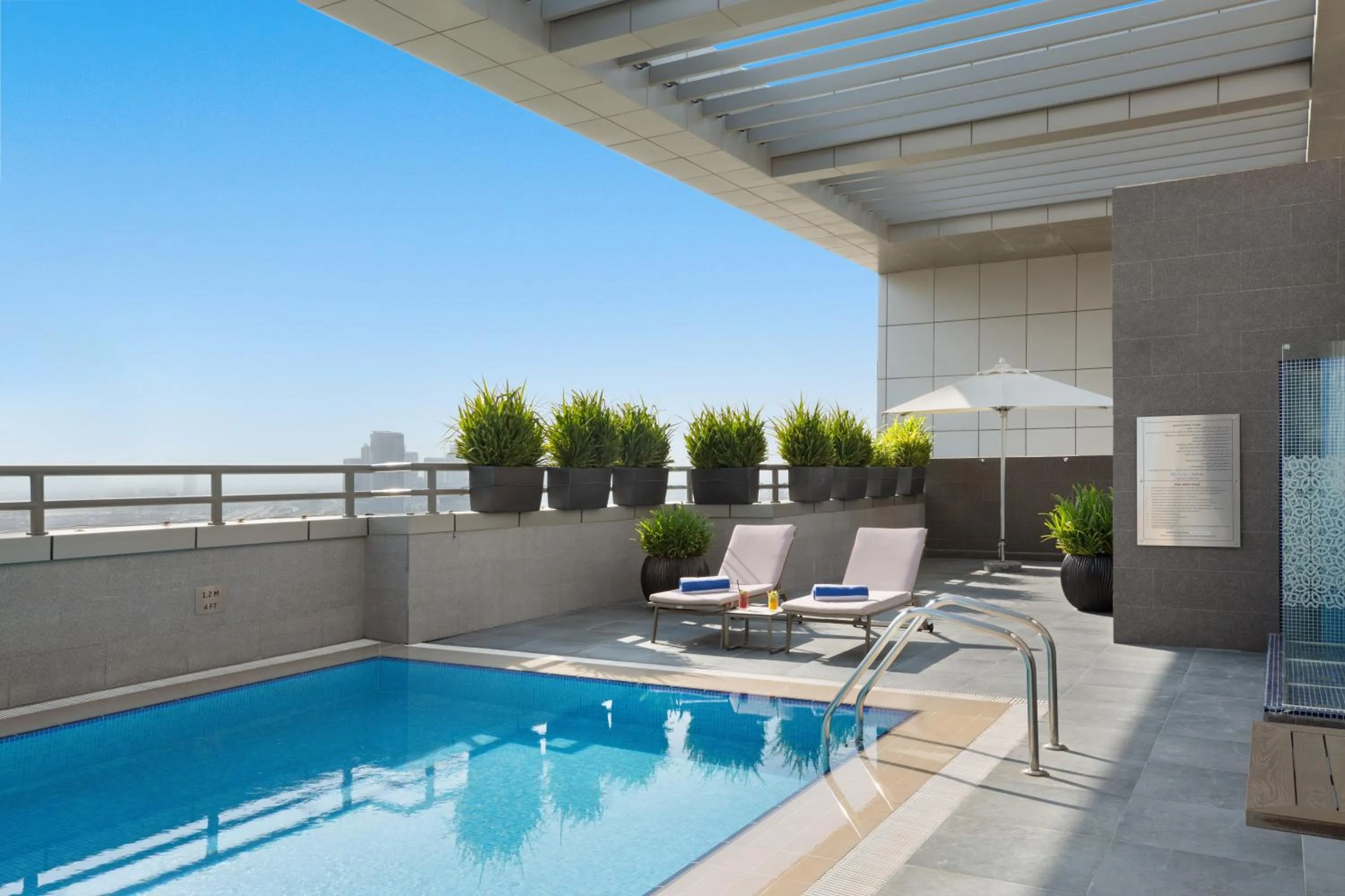 Swimming pool in Royal Continental Suites Business Bay - Deluxe Apartments