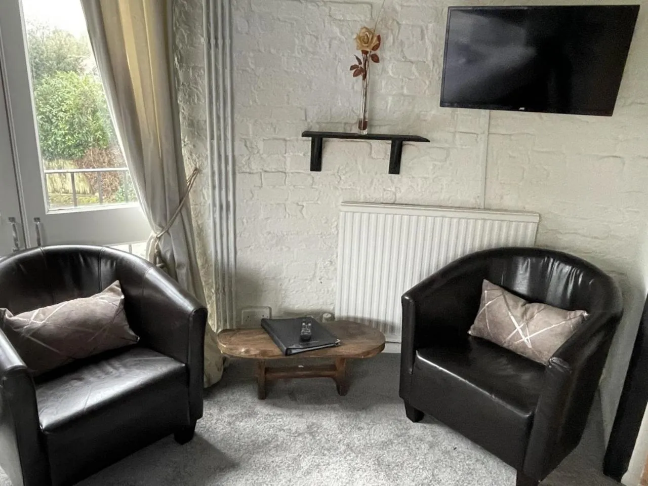 Seating area in Playden Oasts Hotel