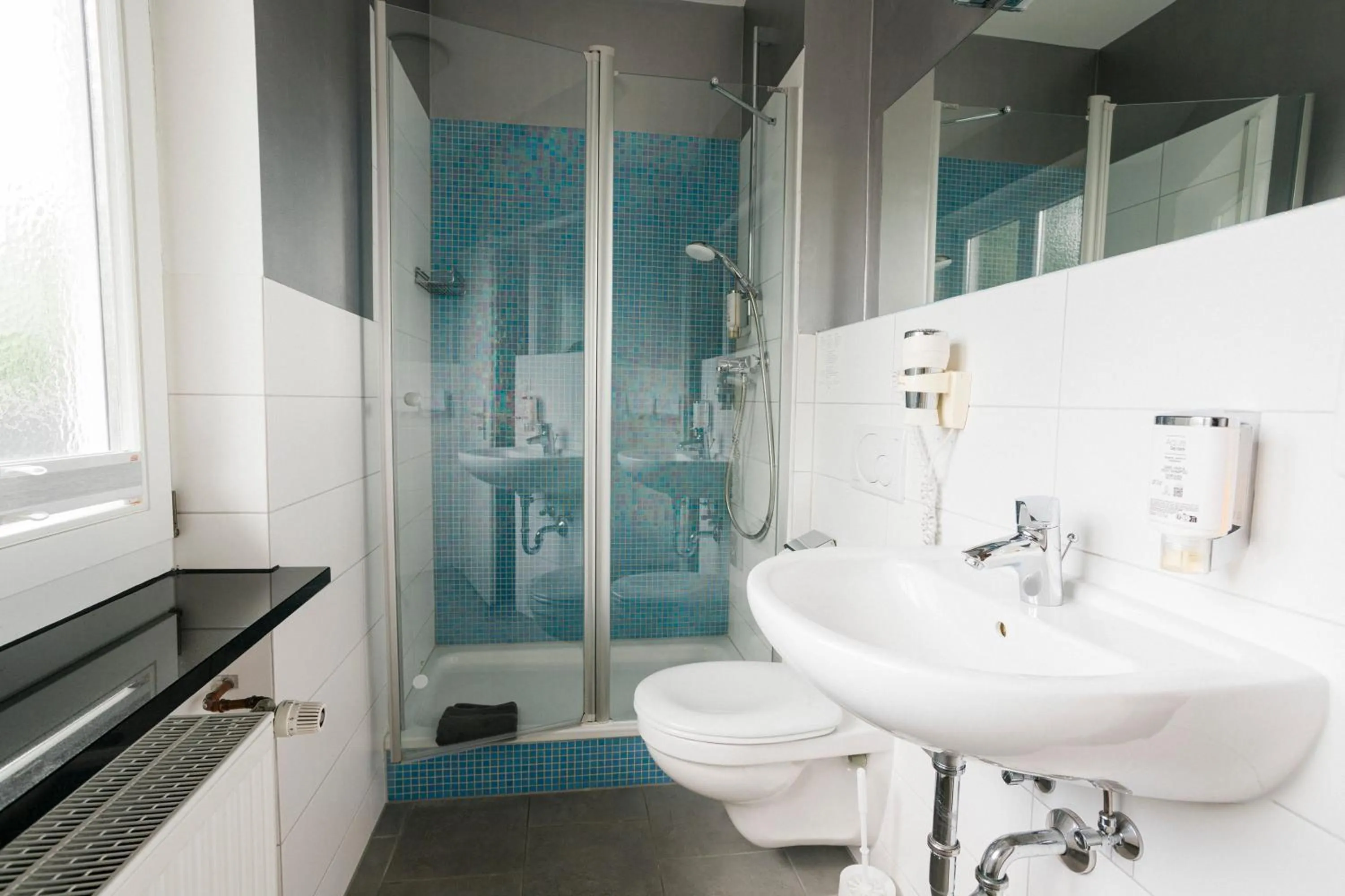 Bathroom in Hotel Villa Solln - free parking