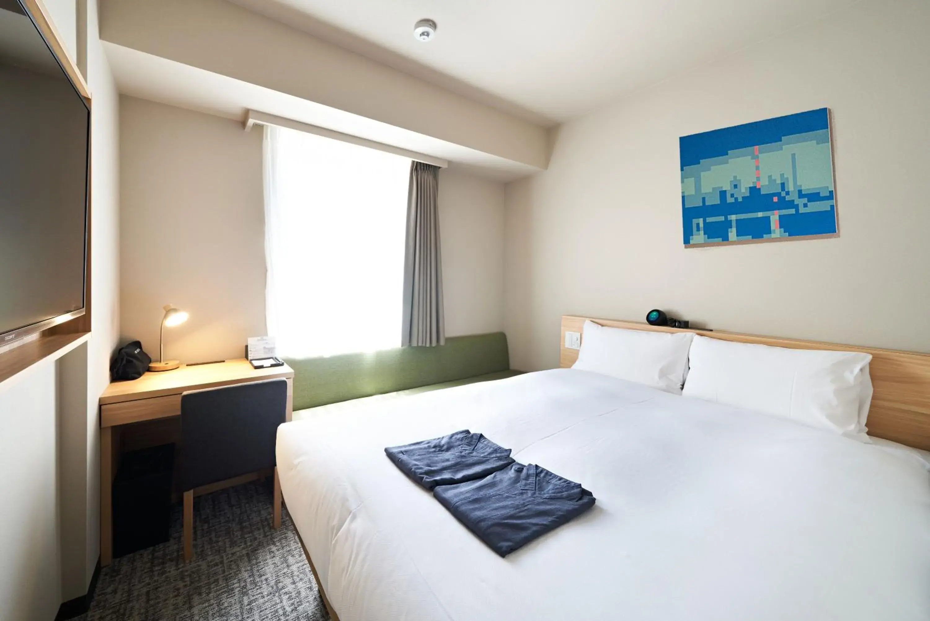 Bed in HOTEL Enmichi Bed in HOTEL Enmichi