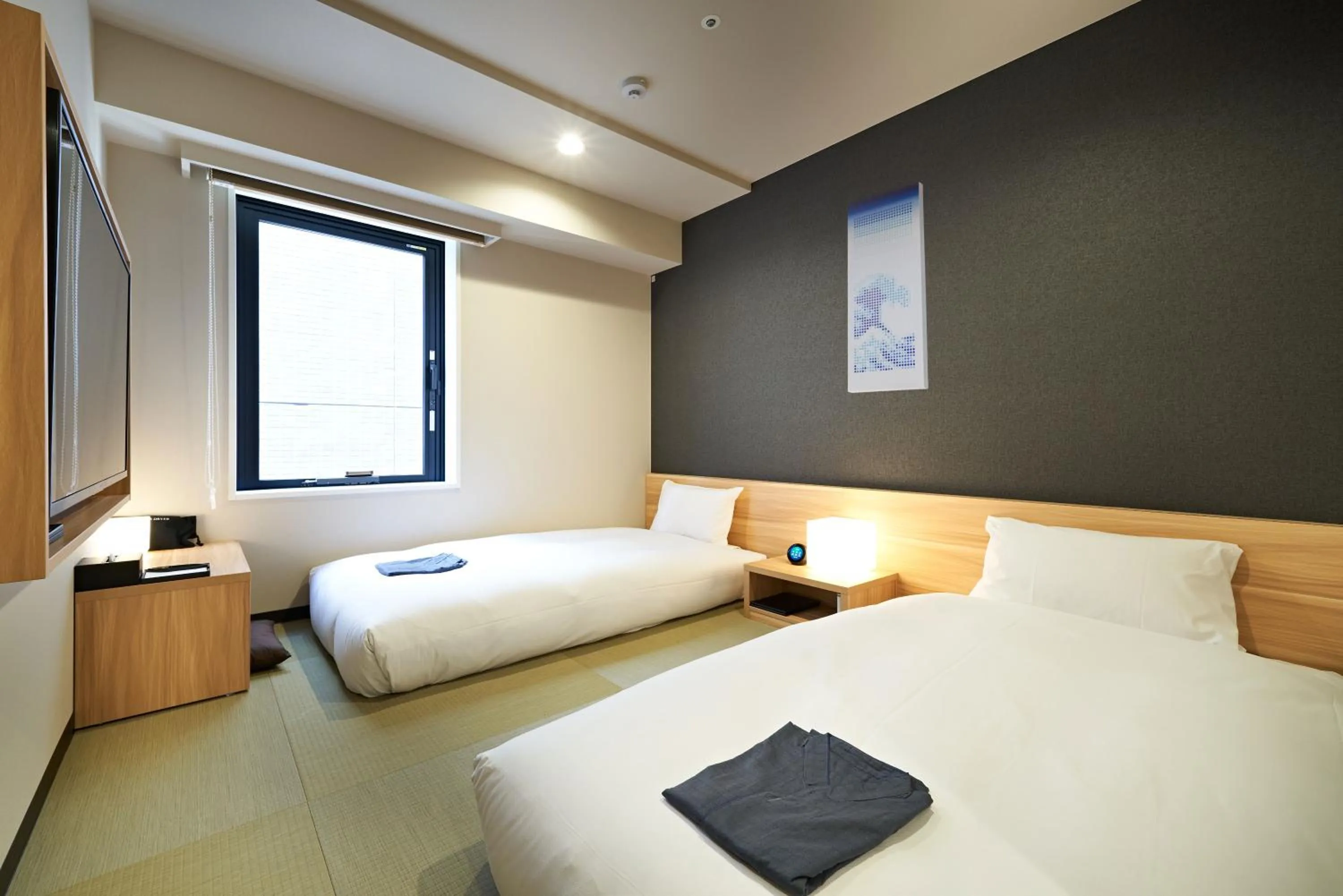 Bed in HOTEL Enmichi