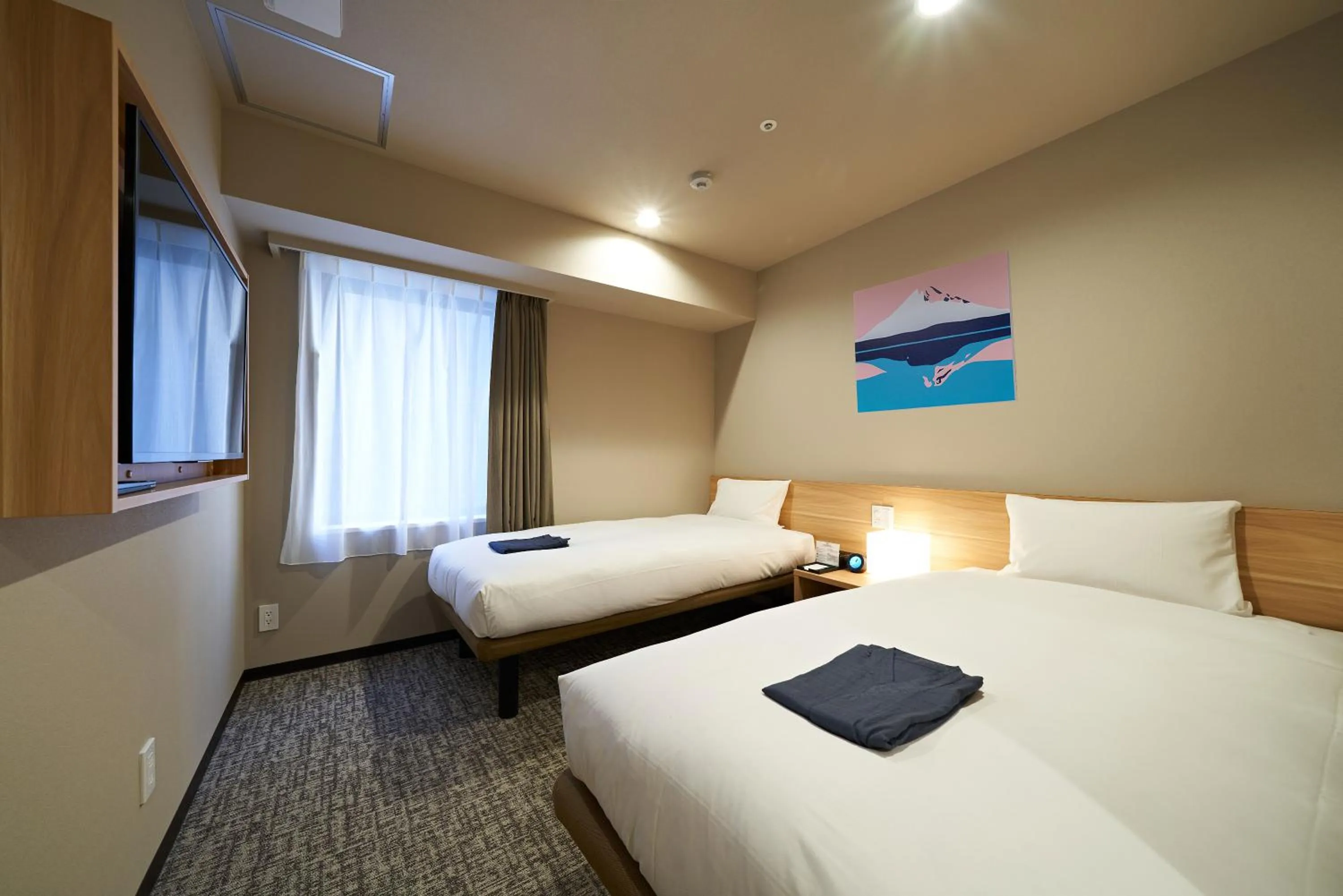 Bed in HOTEL Enmichi