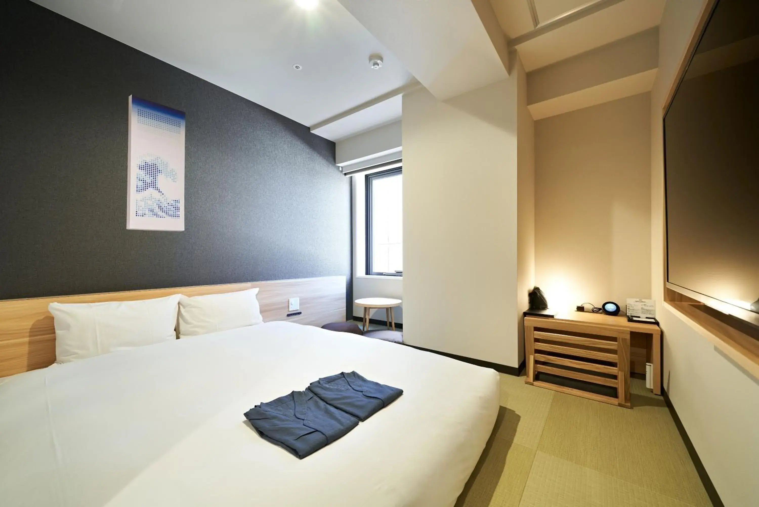 Bed in HOTEL Enmichi Bed in HOTEL Enmichi