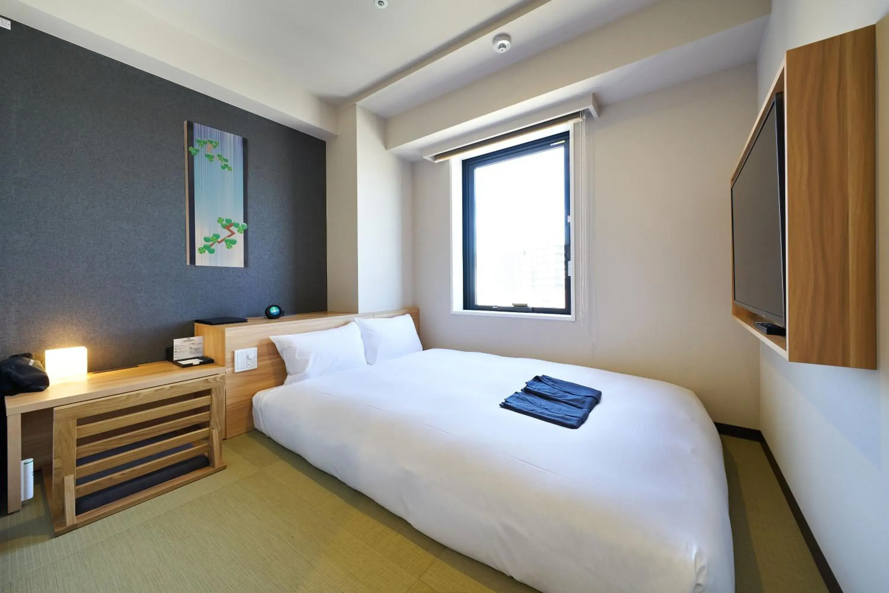 Bed in HOTEL Enmichi Bed in HOTEL Enmichi