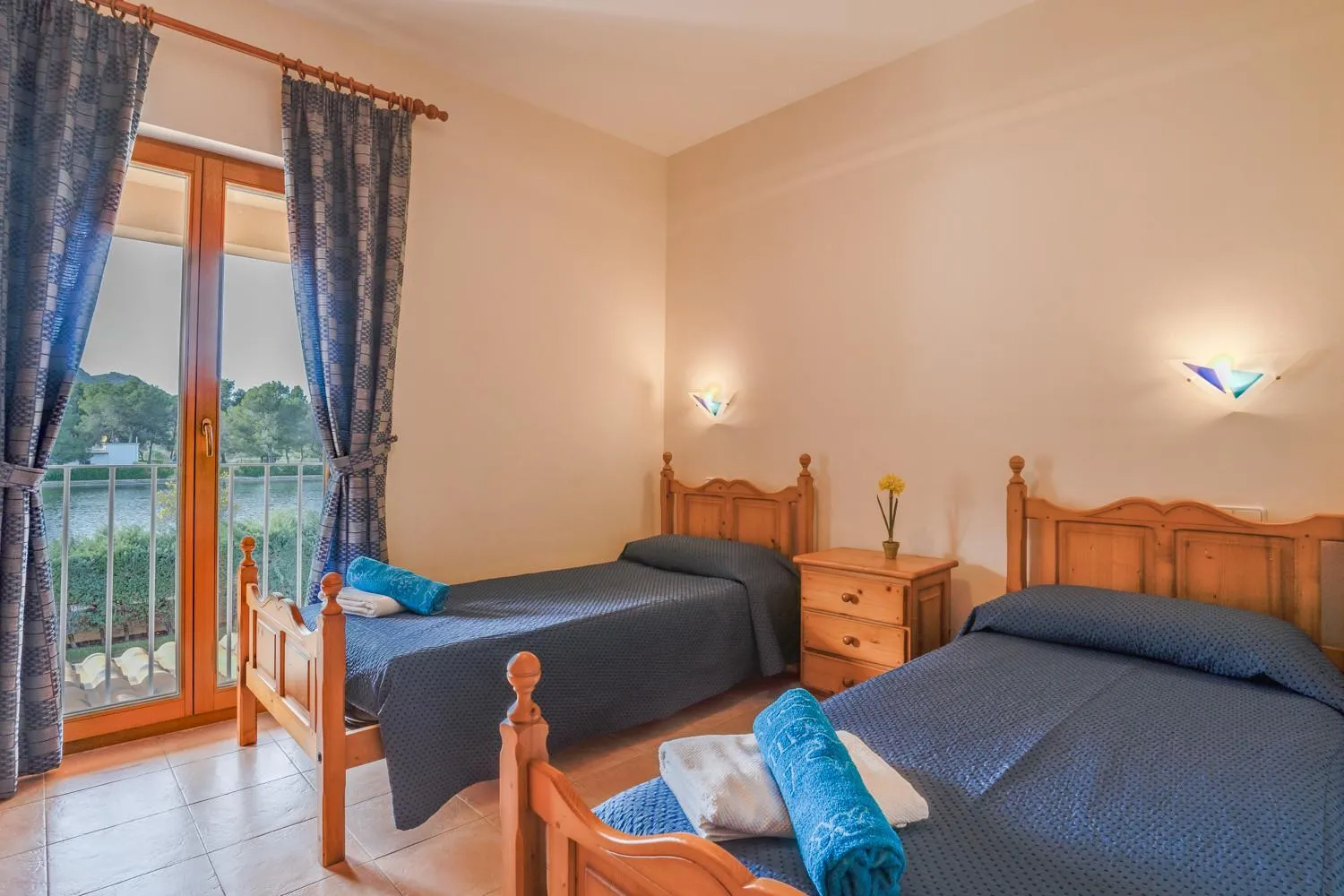 Bed in Villa Puerto Alcudia - Lago Aran Berna by PriorityVillas