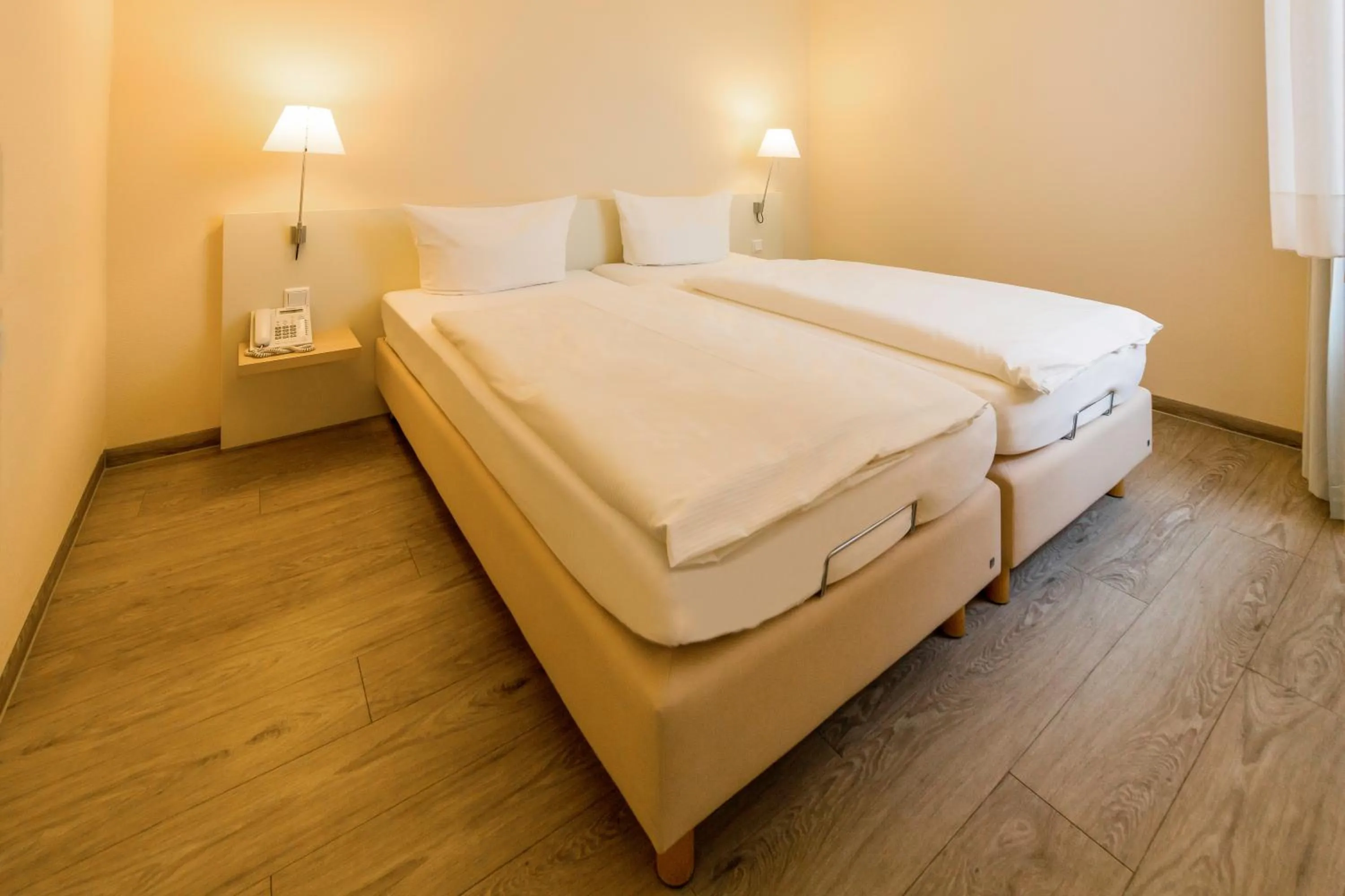 Bed in Michels Thalasso Hotel Nordseehaus