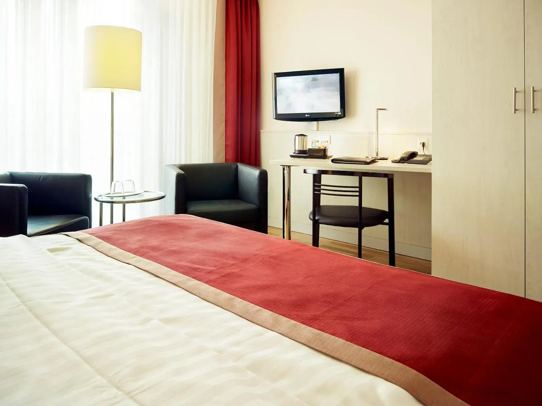 Photo of the whole room, Bed in Hotel Stadt Freiburg Photo of the whole room, Bed in Hotel Stadt Freiburg