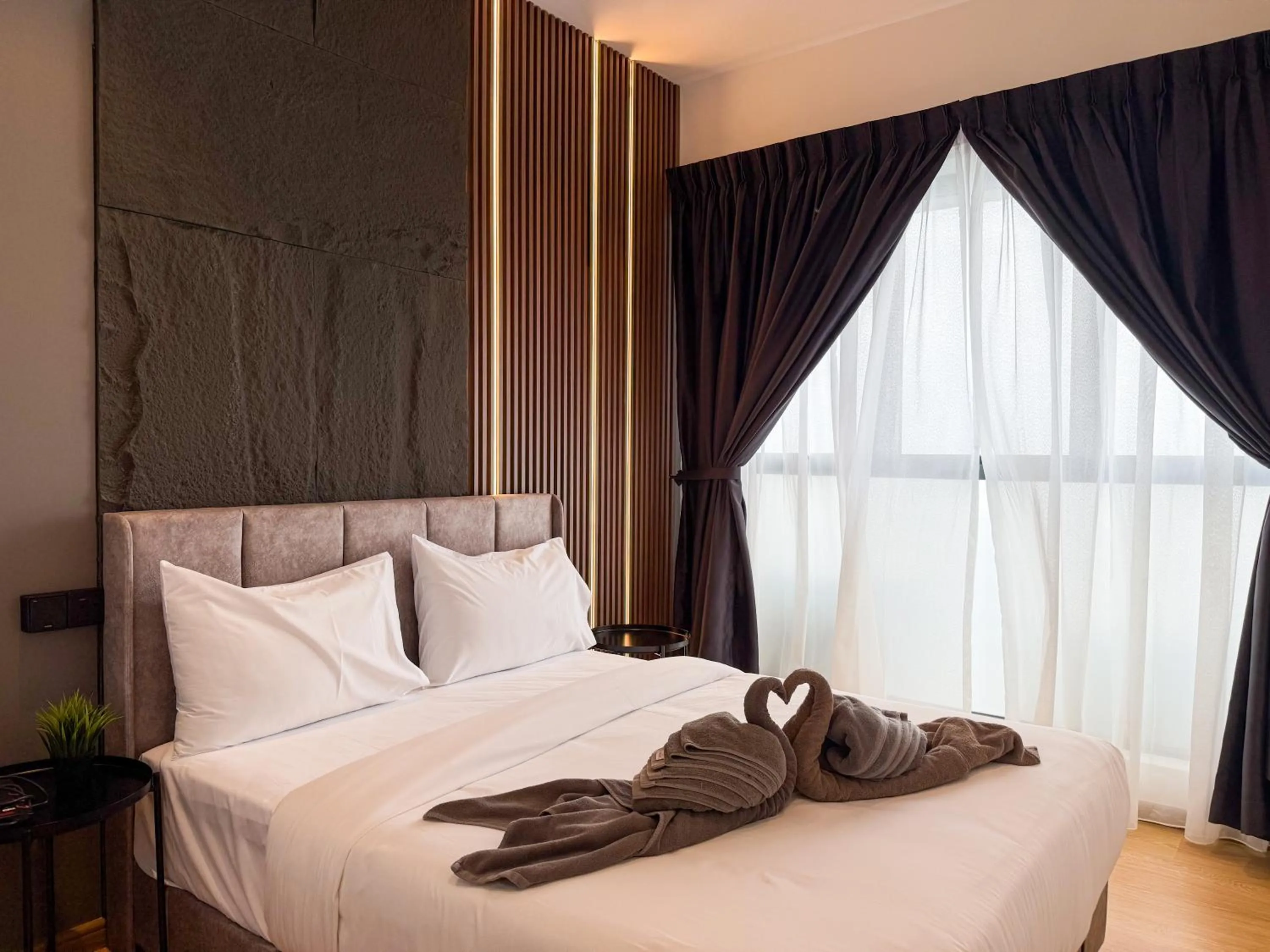 Bed in Country Garden Seaview Suite by Nest Home at Danga Bay