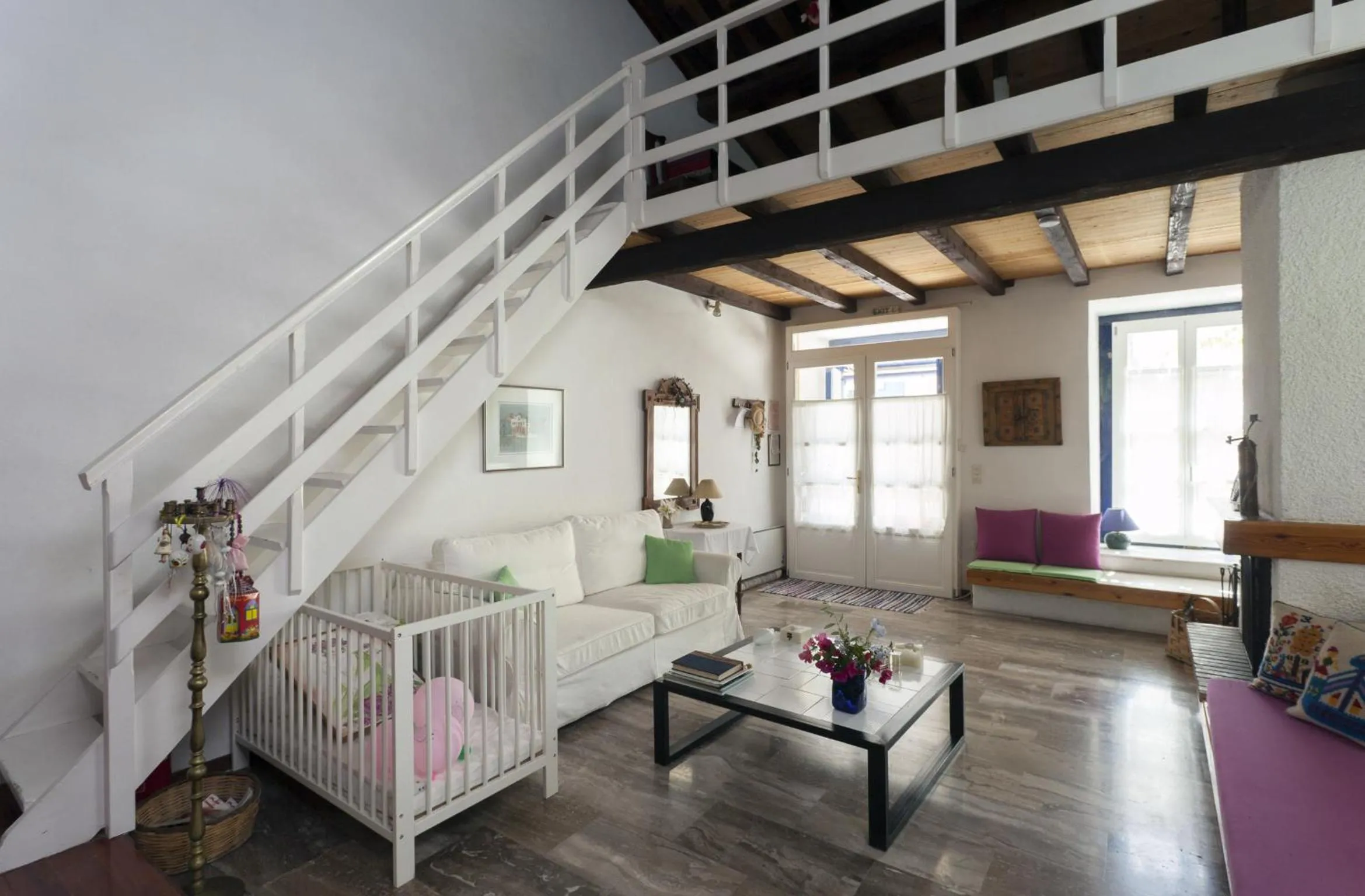 Seating area, Bed in To Spitaki Apartments