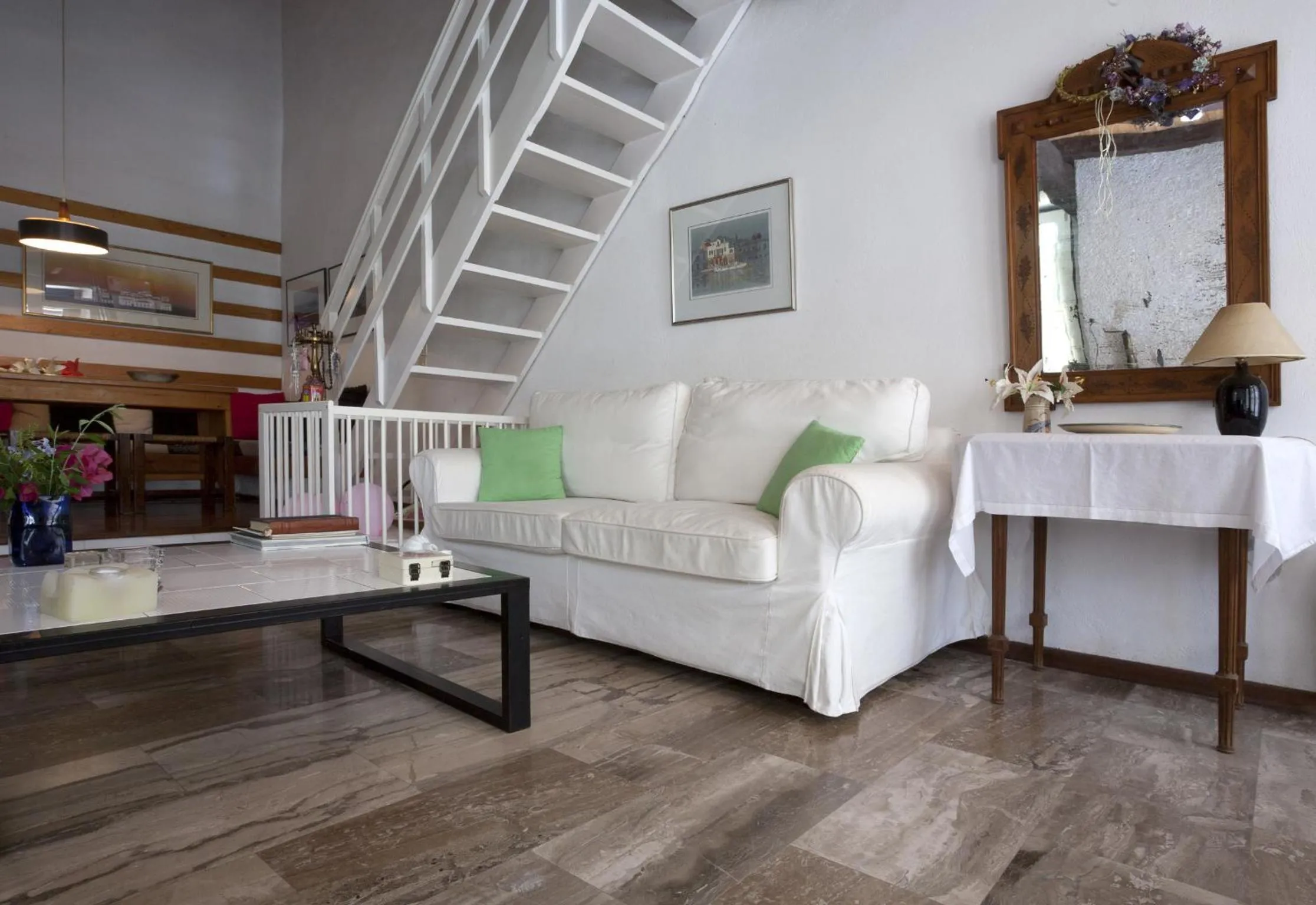 Seating area, Bed in To Spitaki Apartments