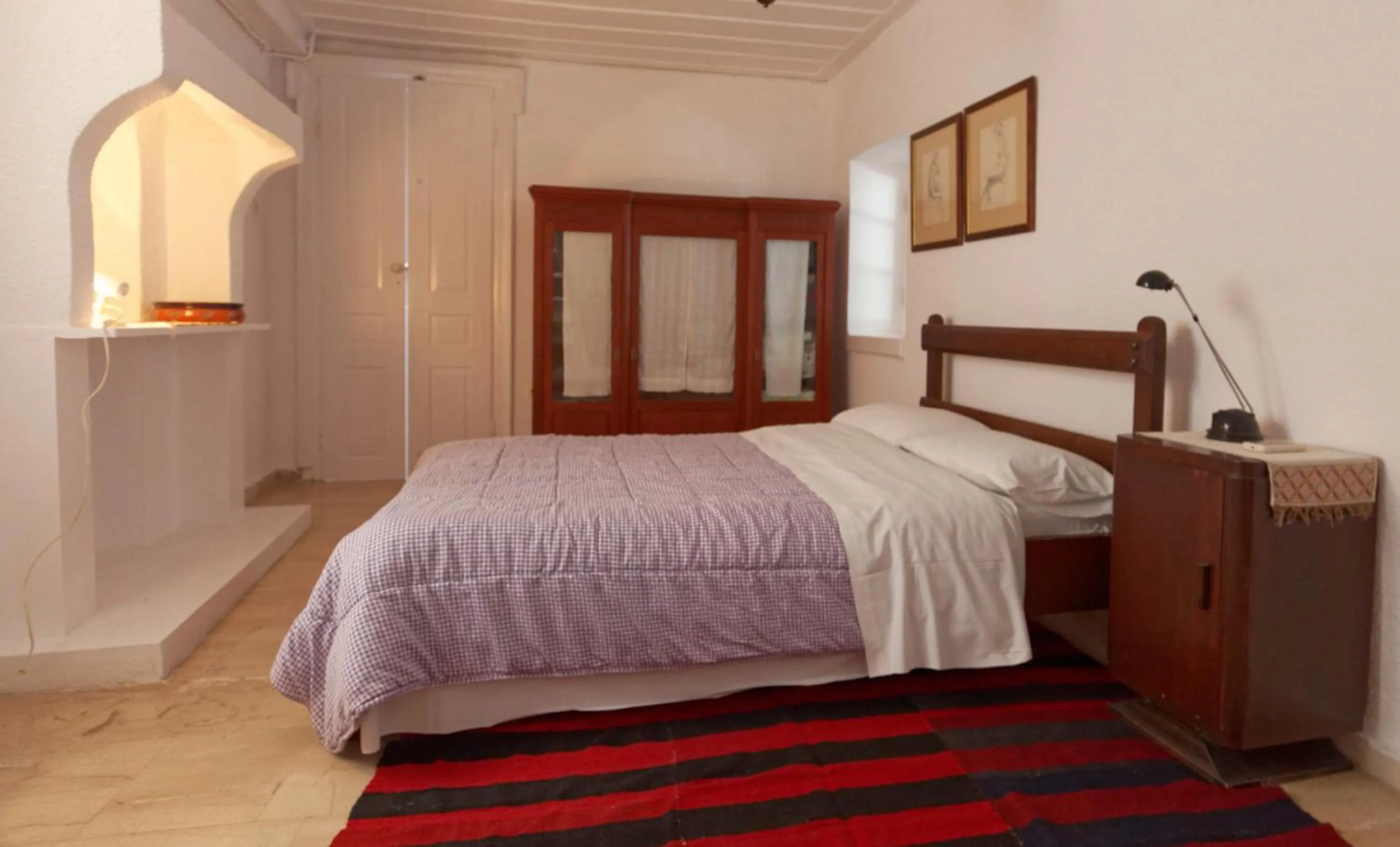 Bed in To Spitaki Apartments