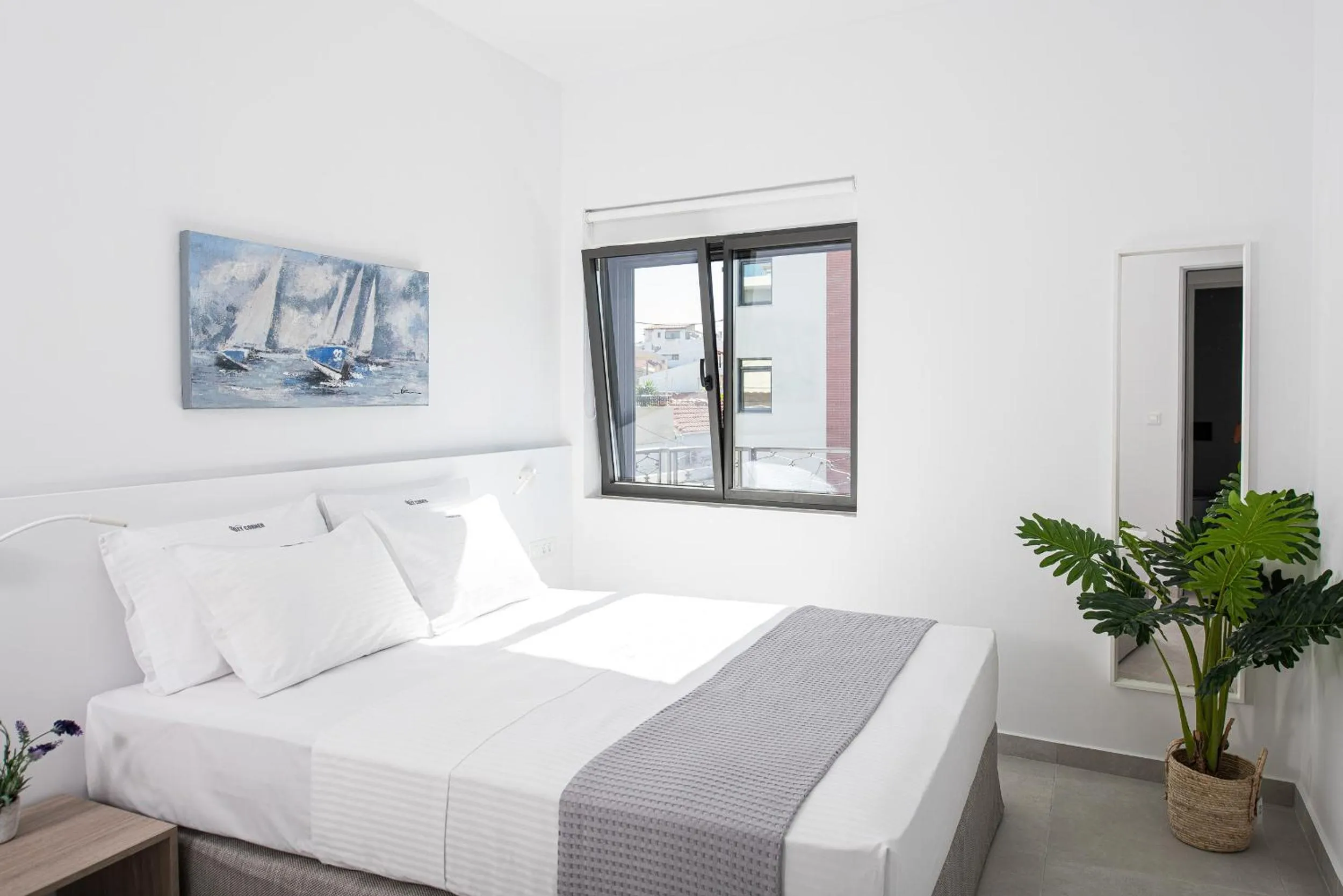 Bed in Cozy Corner Luxury Apartments