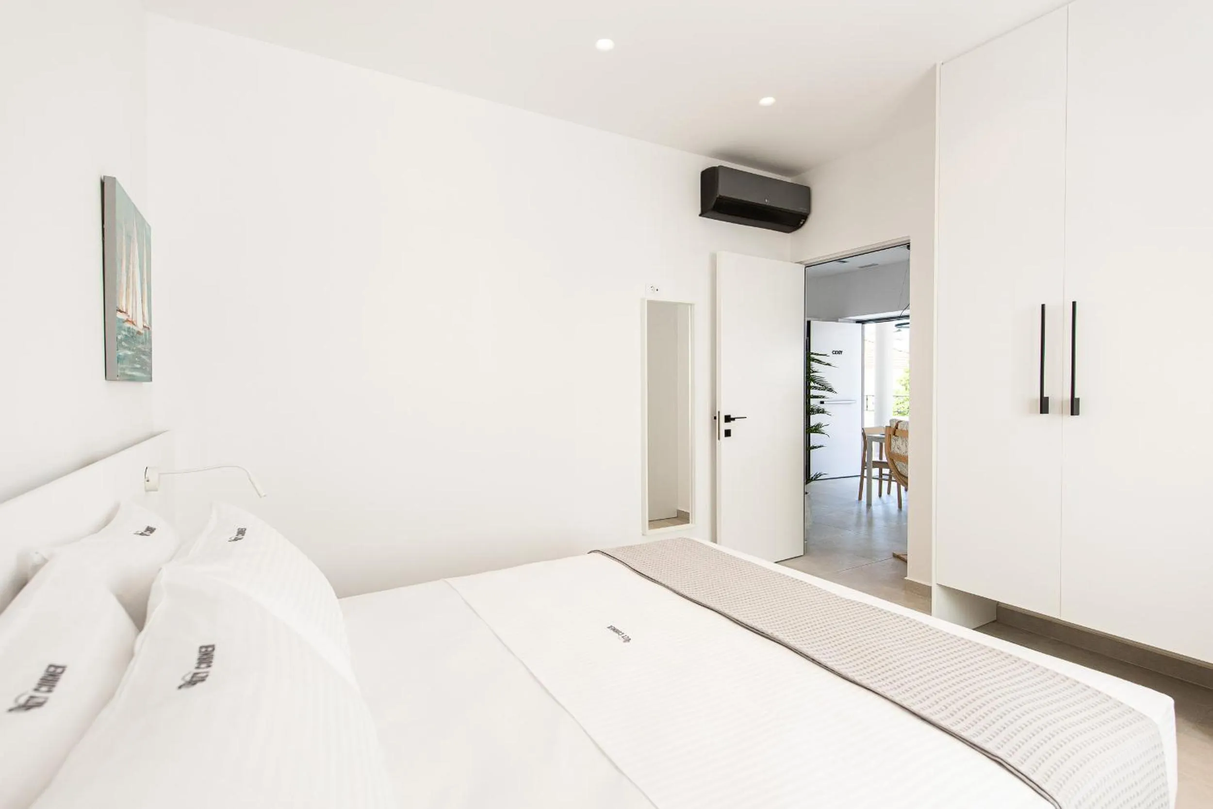 Bed in Cozy Corner Luxury Apartments