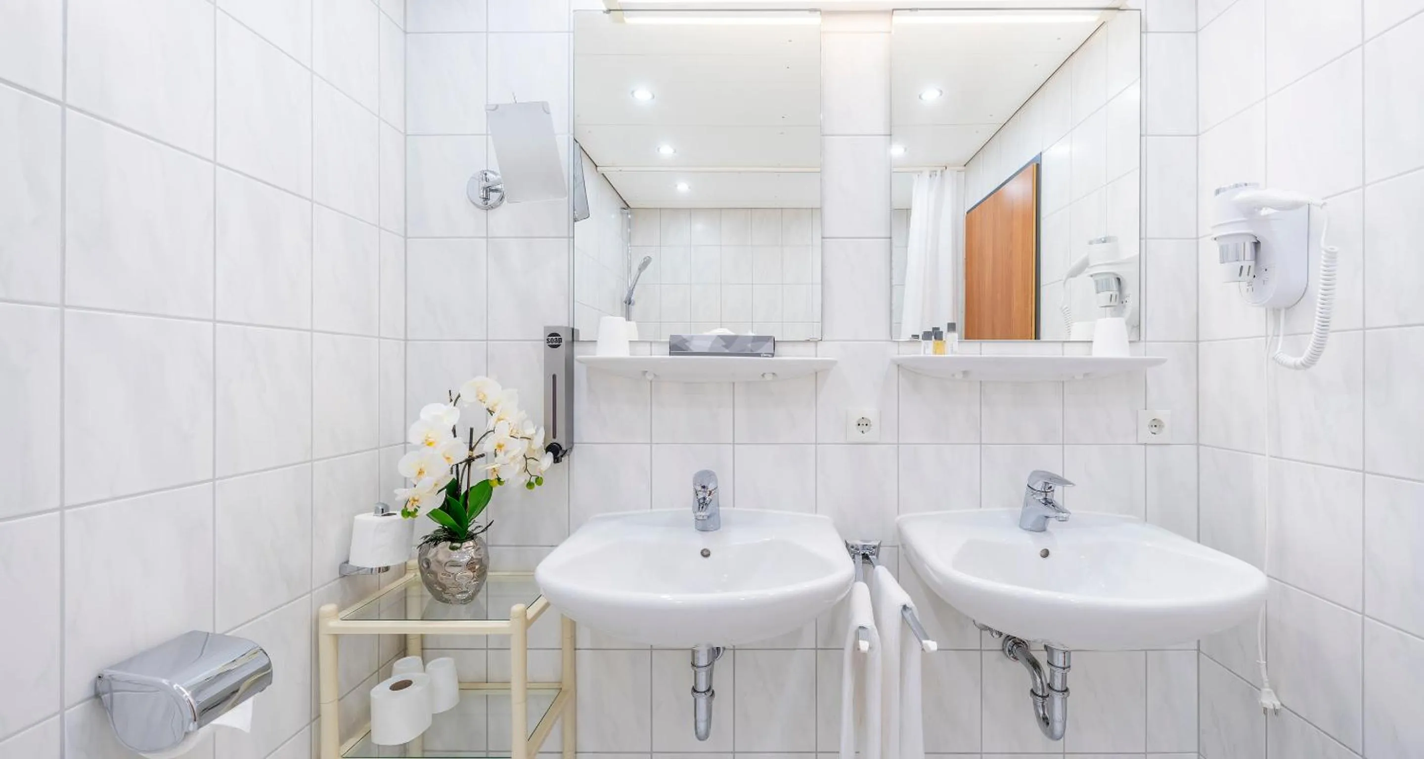 Bathroom in PLAZA Hotel Föhr am Bodensee